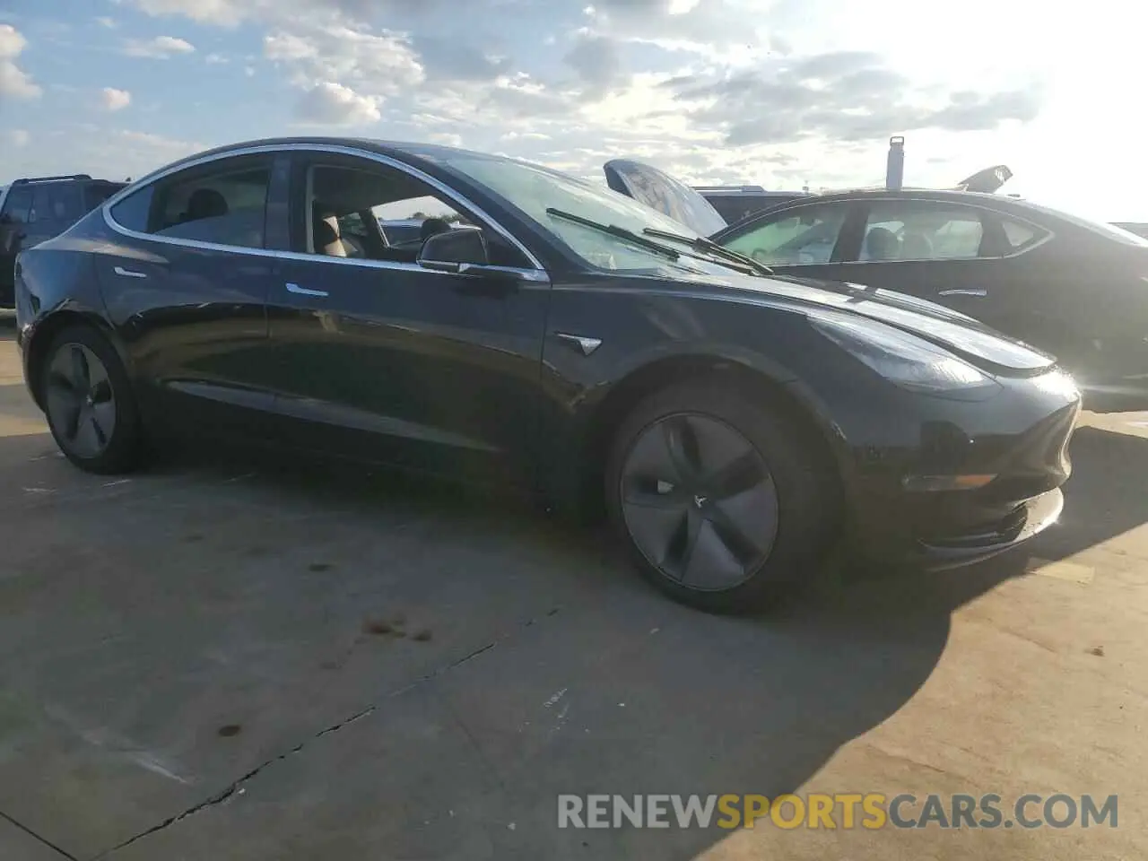4 Photograph of a damaged car 5YJ3E1EB4LF600203 TESLA MODEL 3 2020