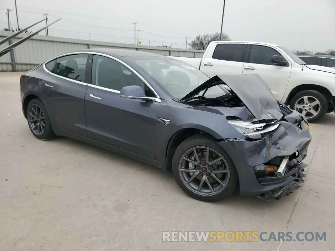 4 Photograph of a damaged car 5YJ3E1EB4LF616479 TESLA MODEL 3 2020