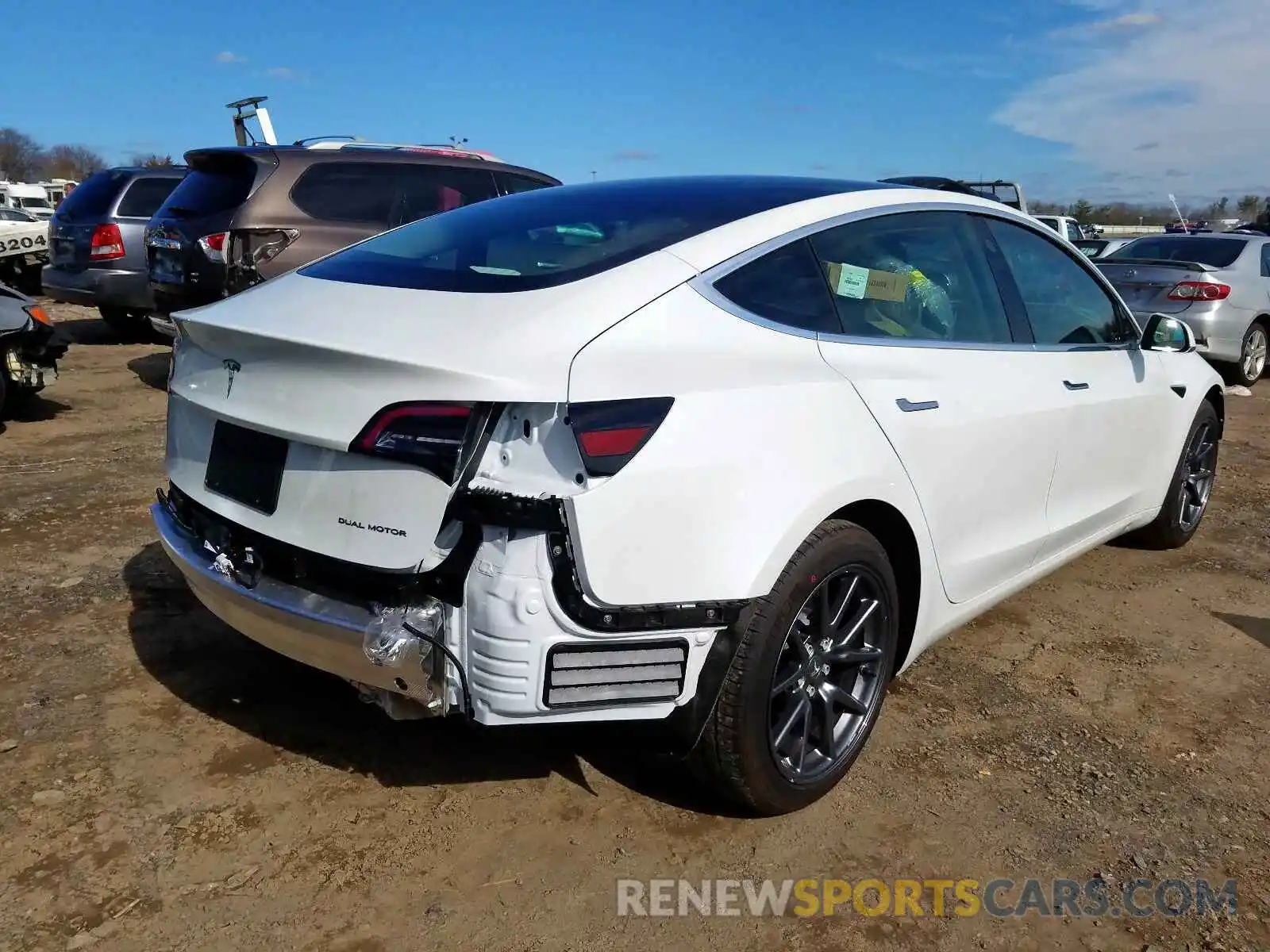 4 Photograph of a damaged car 5YJ3E1EB4LF618281 TESLA MODEL 3 2020