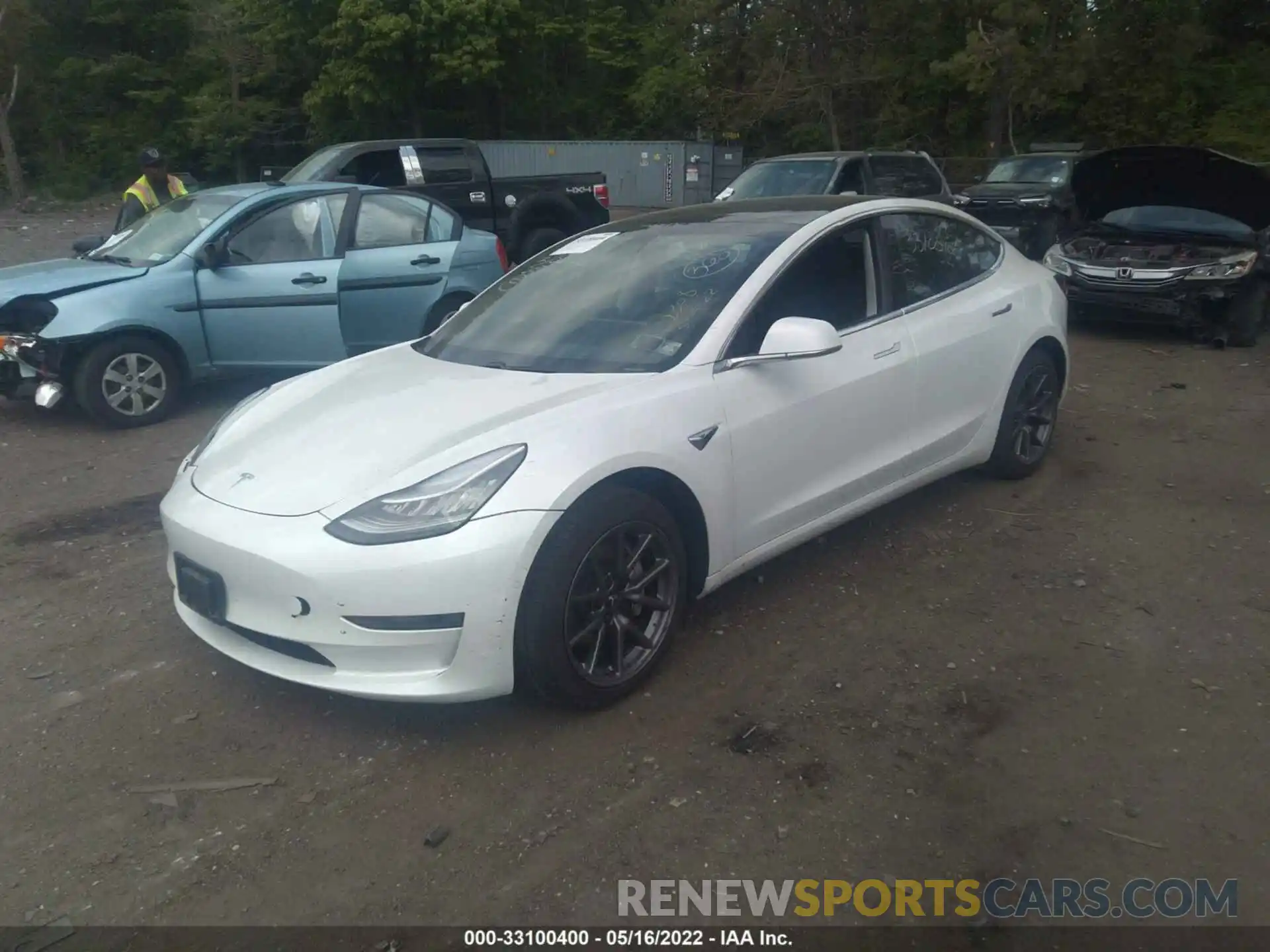 2 Photograph of a damaged car 5YJ3E1EB4LF618569 TESLA MODEL 3 2020