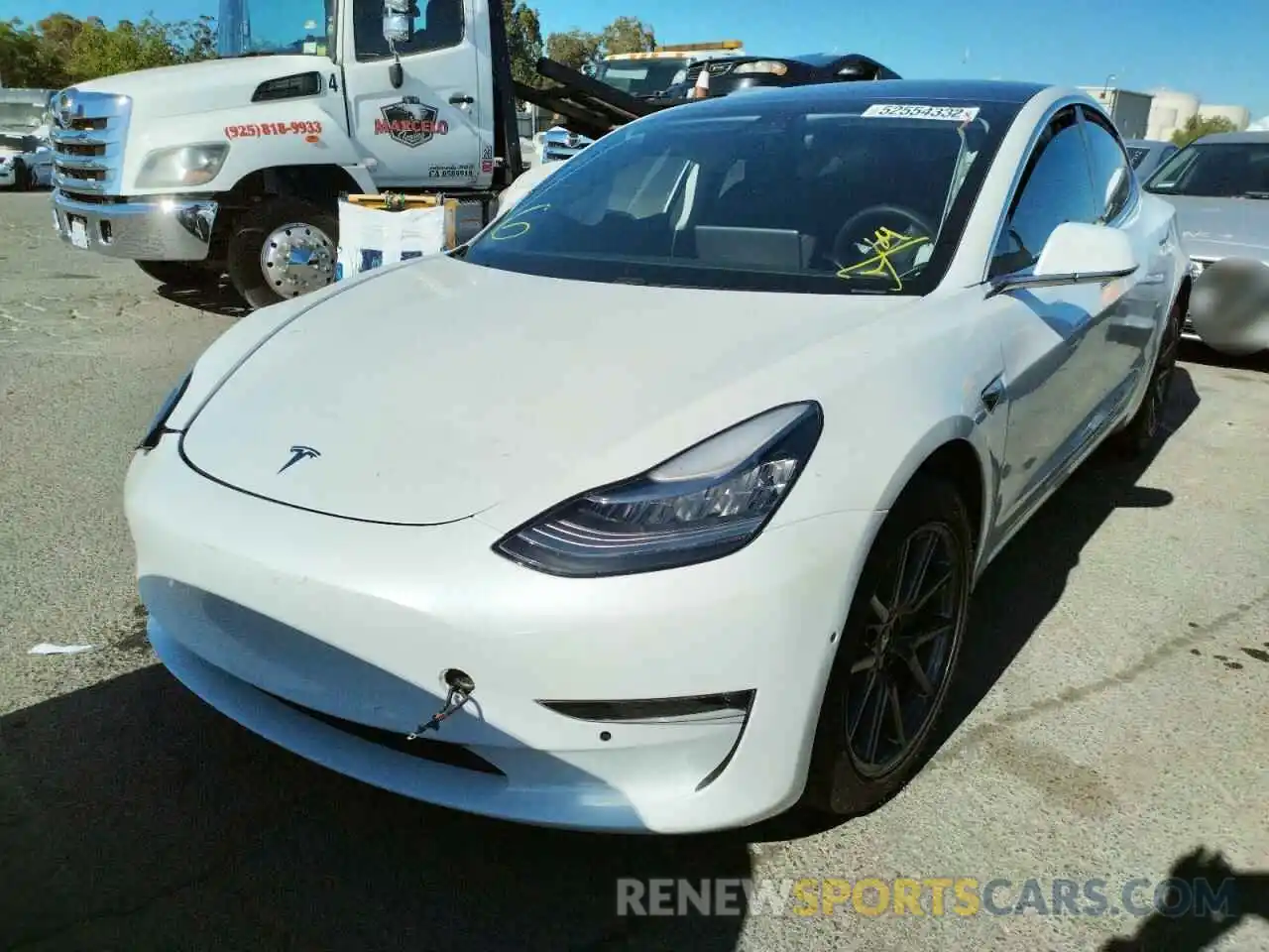 2 Photograph of a damaged car 5YJ3E1EB4LF619401 TESLA MODEL 3 2020