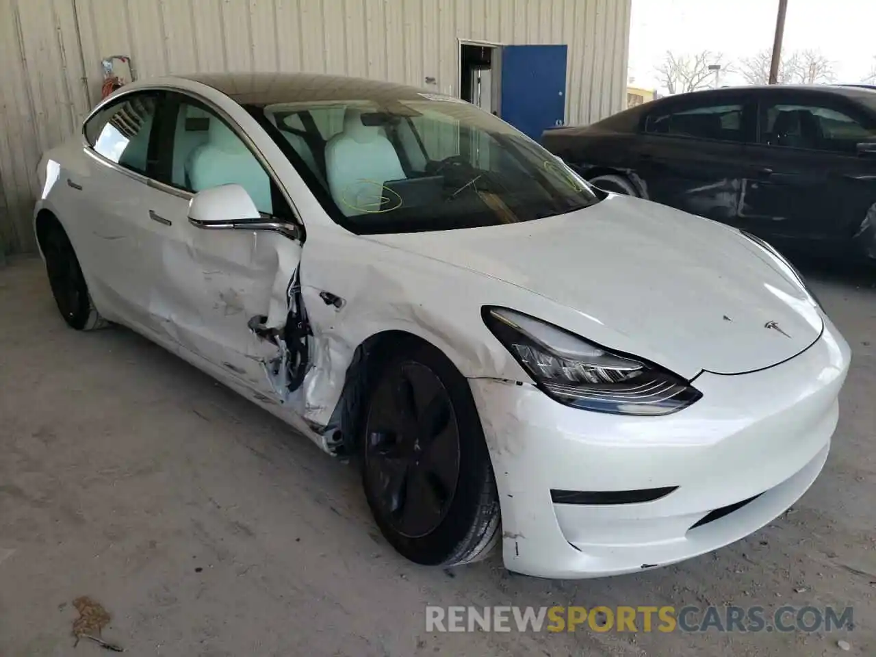 1 Photograph of a damaged car 5YJ3E1EB4LF622122 TESLA MODEL 3 2020