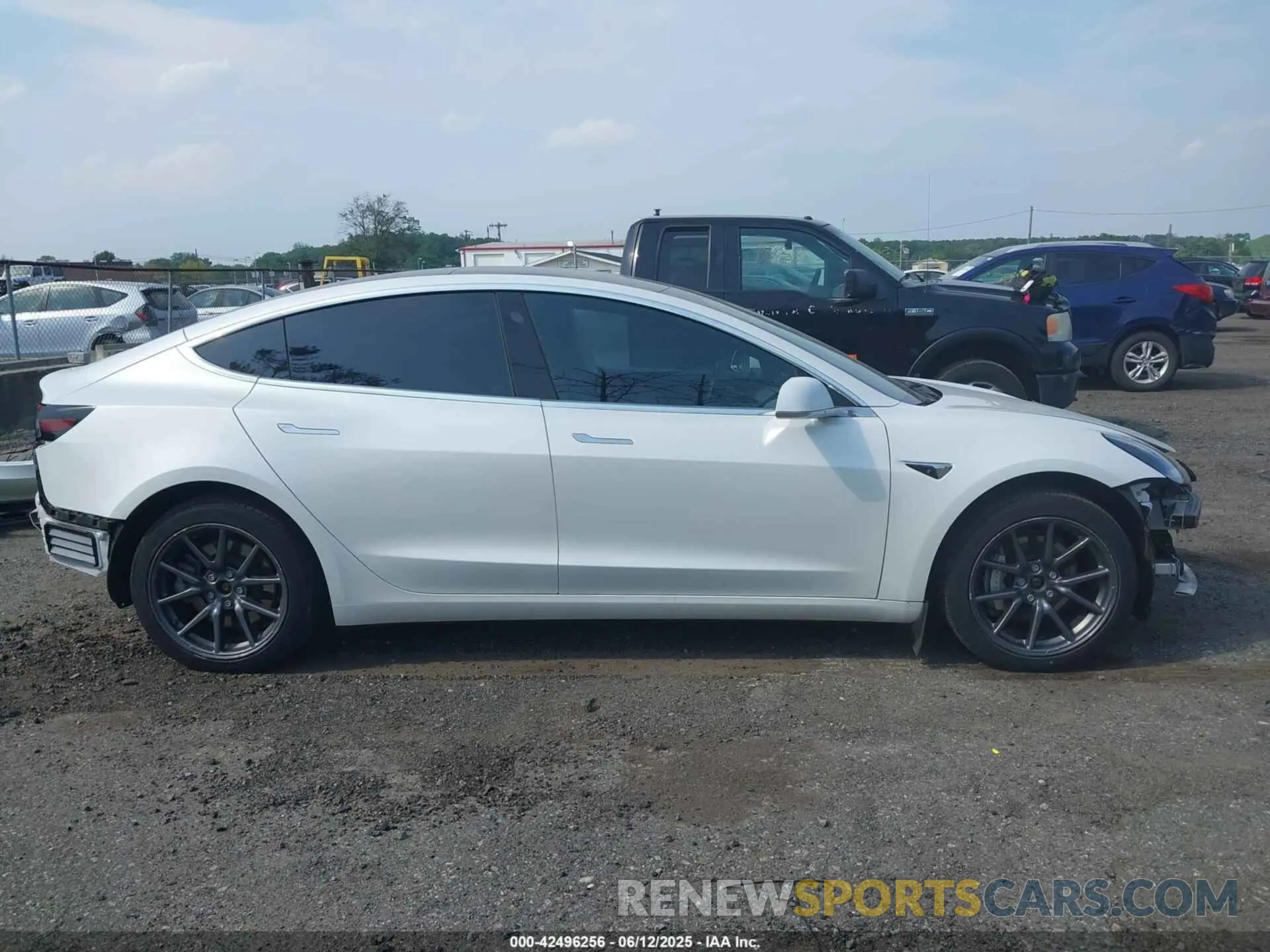 12 Photograph of a damaged car 5YJ3E1EB4LF637090 TESLA MODEL 3 2020