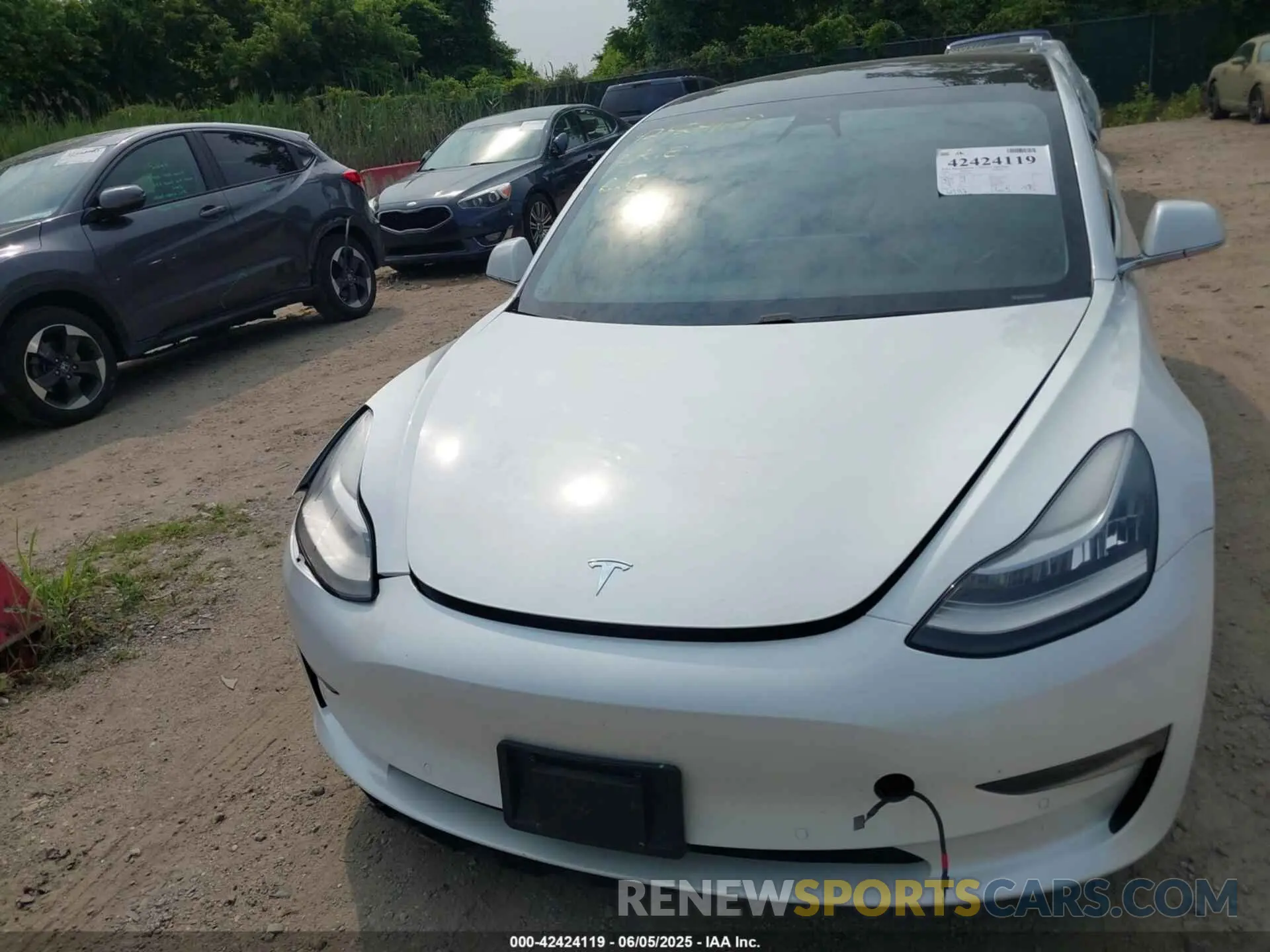 12 Photograph of a damaged car 5YJ3E1EB4LF637770 TESLA MODEL 3 2020