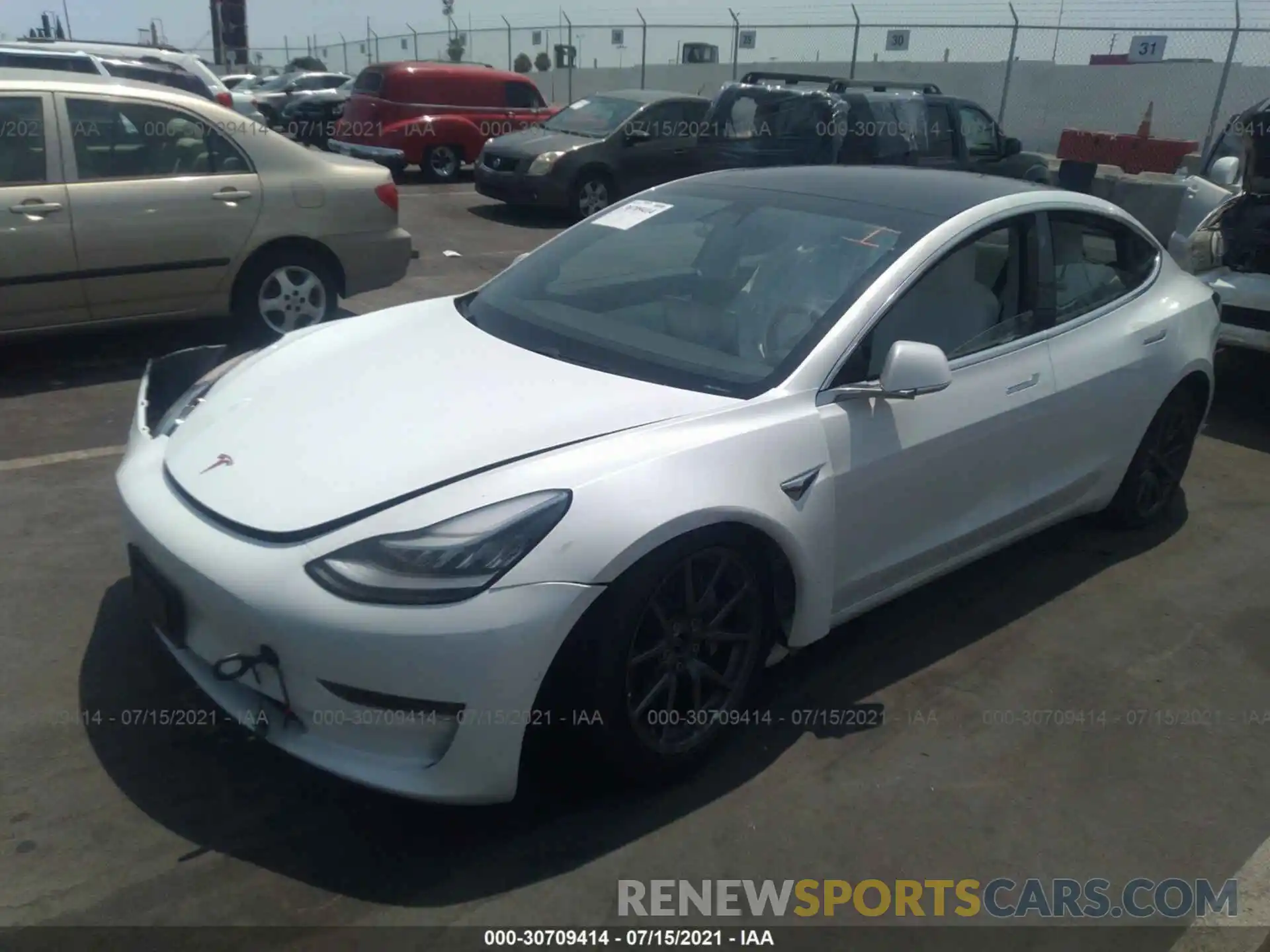 2 Photograph of a damaged car 5YJ3E1EB4LF651569 TESLA MODEL 3 2020