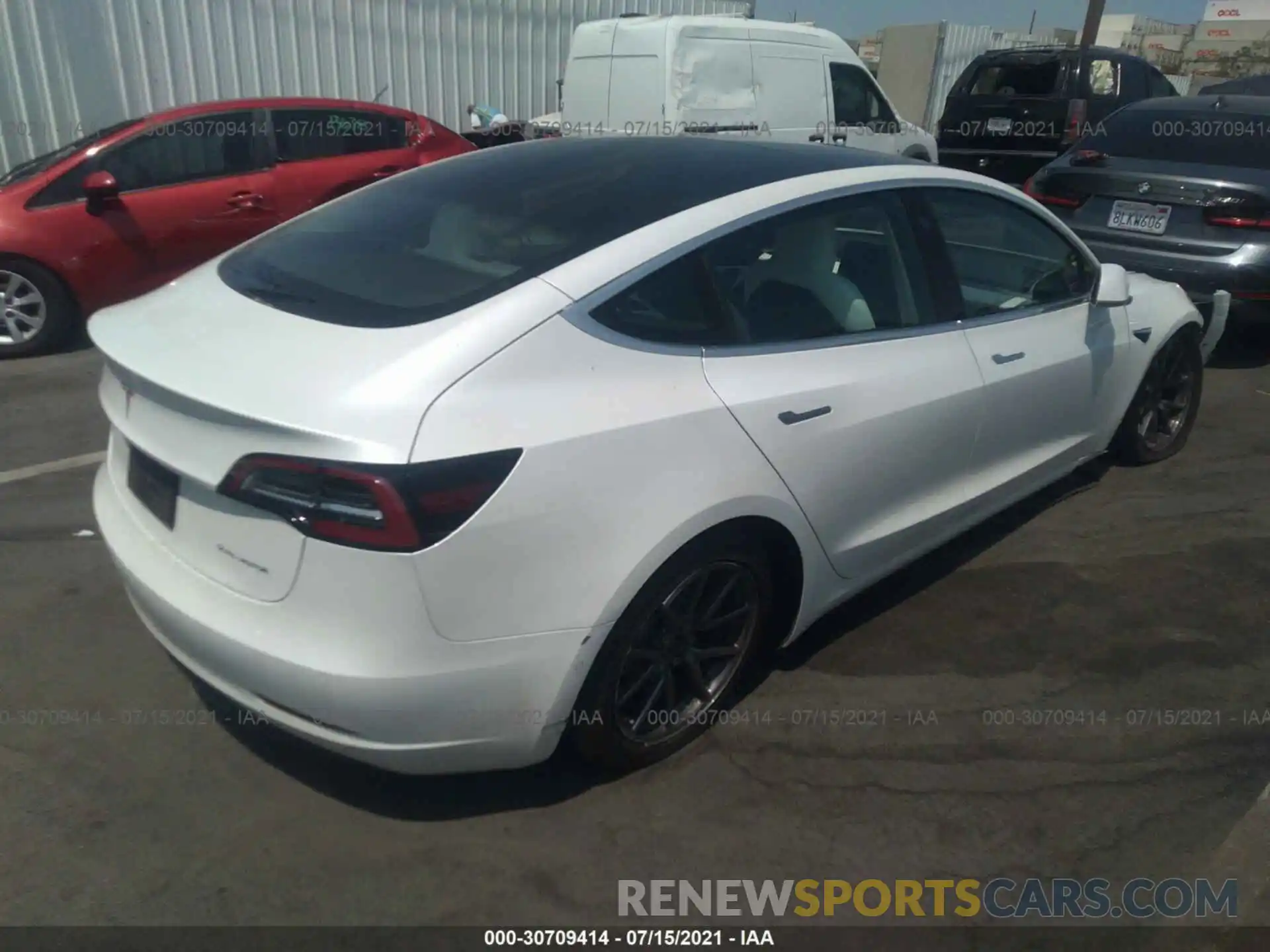 4 Photograph of a damaged car 5YJ3E1EB4LF651569 TESLA MODEL 3 2020