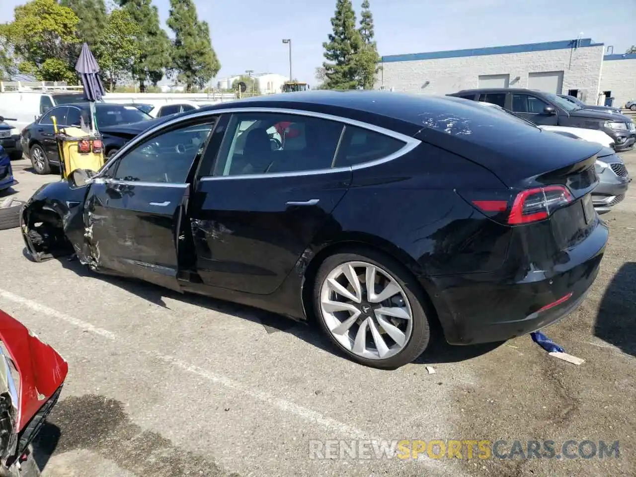 2 Photograph of a damaged car 5YJ3E1EB4LF663110 TESLA MODEL 3 2020