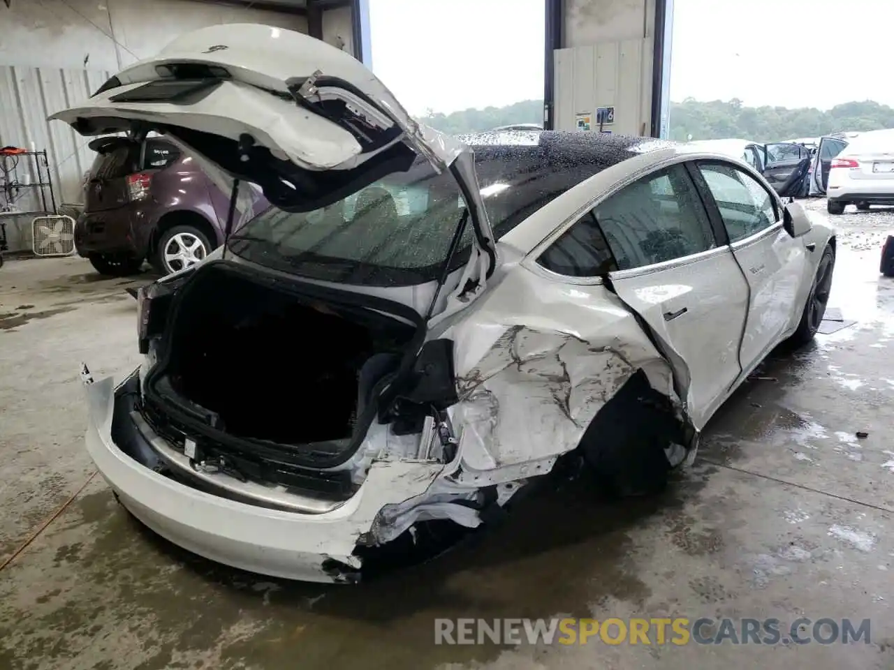 4 Photograph of a damaged car 5YJ3E1EB4LF665603 TESLA MODEL 3 2020