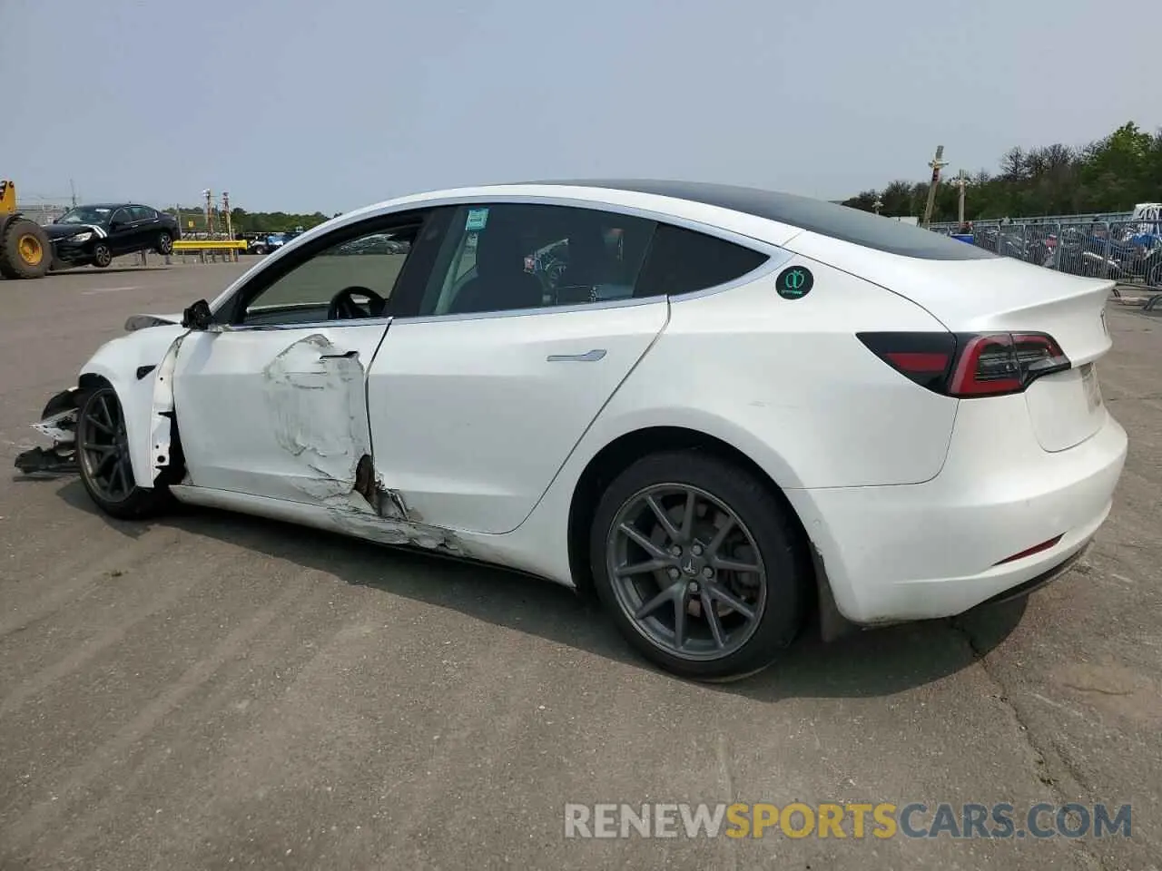 2 Photograph of a damaged car 5YJ3E1EB4LF744477 TESLA MODEL 3 2020