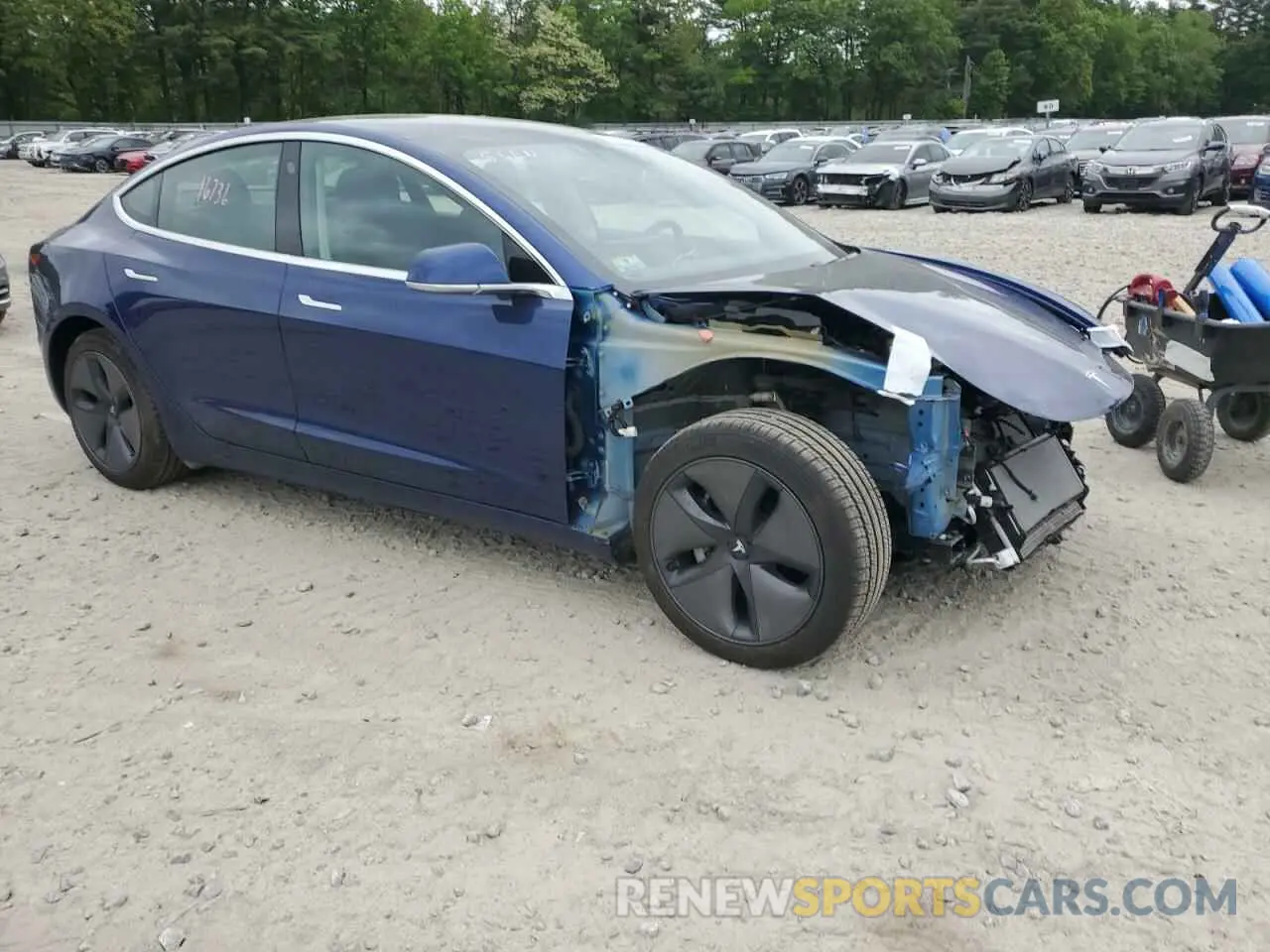 4 Photograph of a damaged car 5YJ3E1EB4LF770299 TESLA MODEL 3 2020