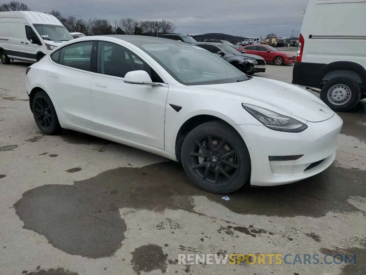 4 Photograph of a damaged car 5YJ3E1EB4LF790679 TESLA MODEL 3 2020