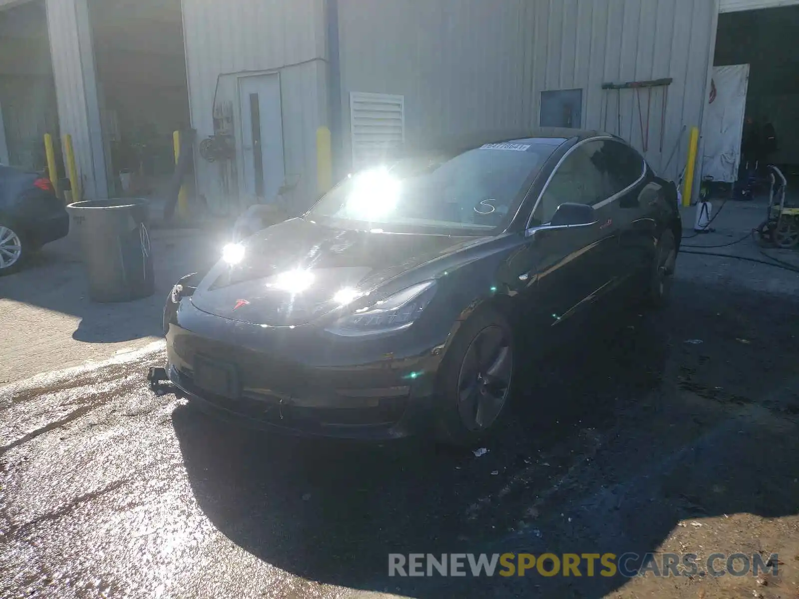 2 Photograph of a damaged car 5YJ3E1EB4LF791167 TESLA MODEL 3 2020