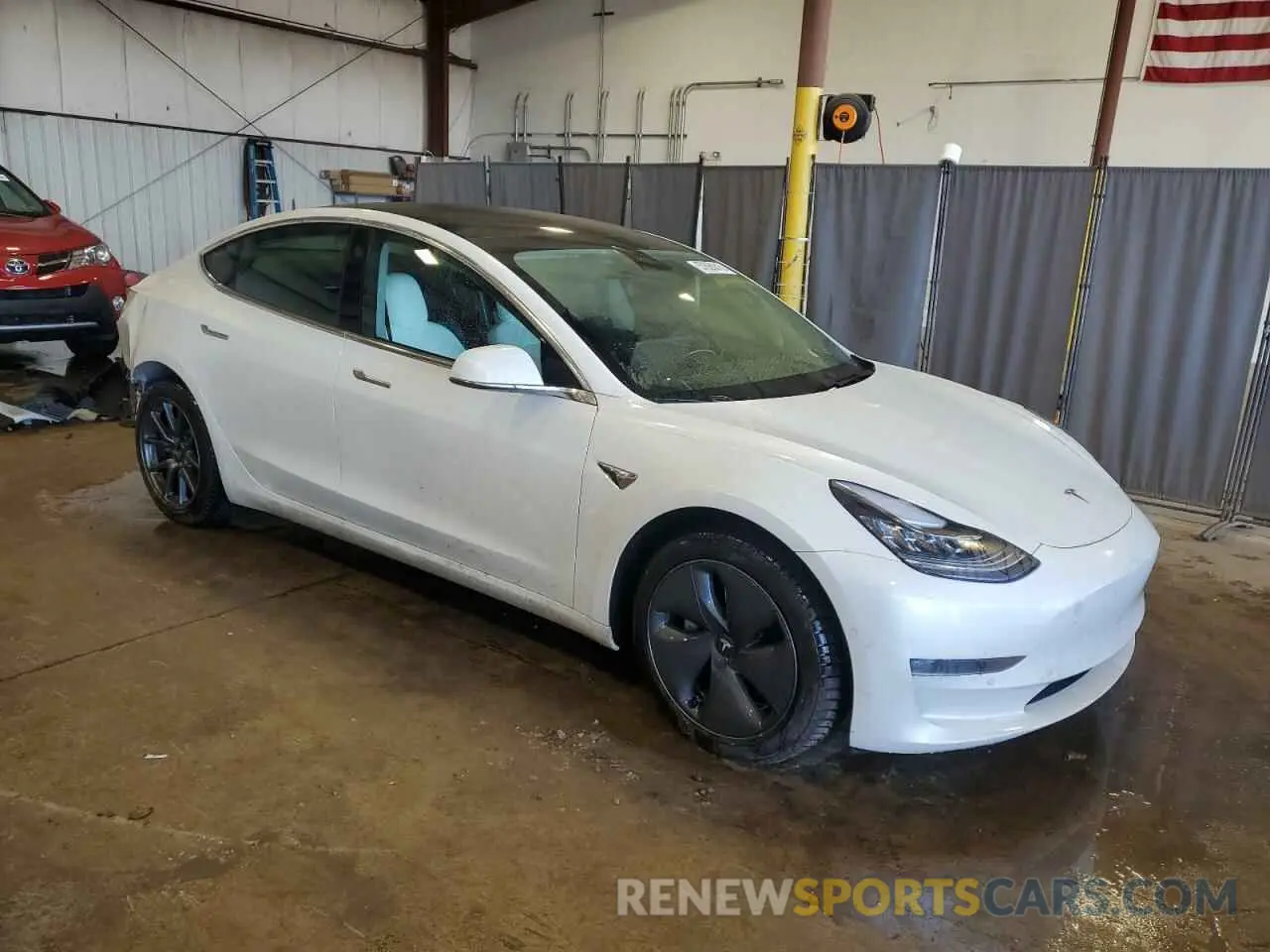4 Photograph of a damaged car 5YJ3E1EB5LF525446 TESLA MODEL 3 2020