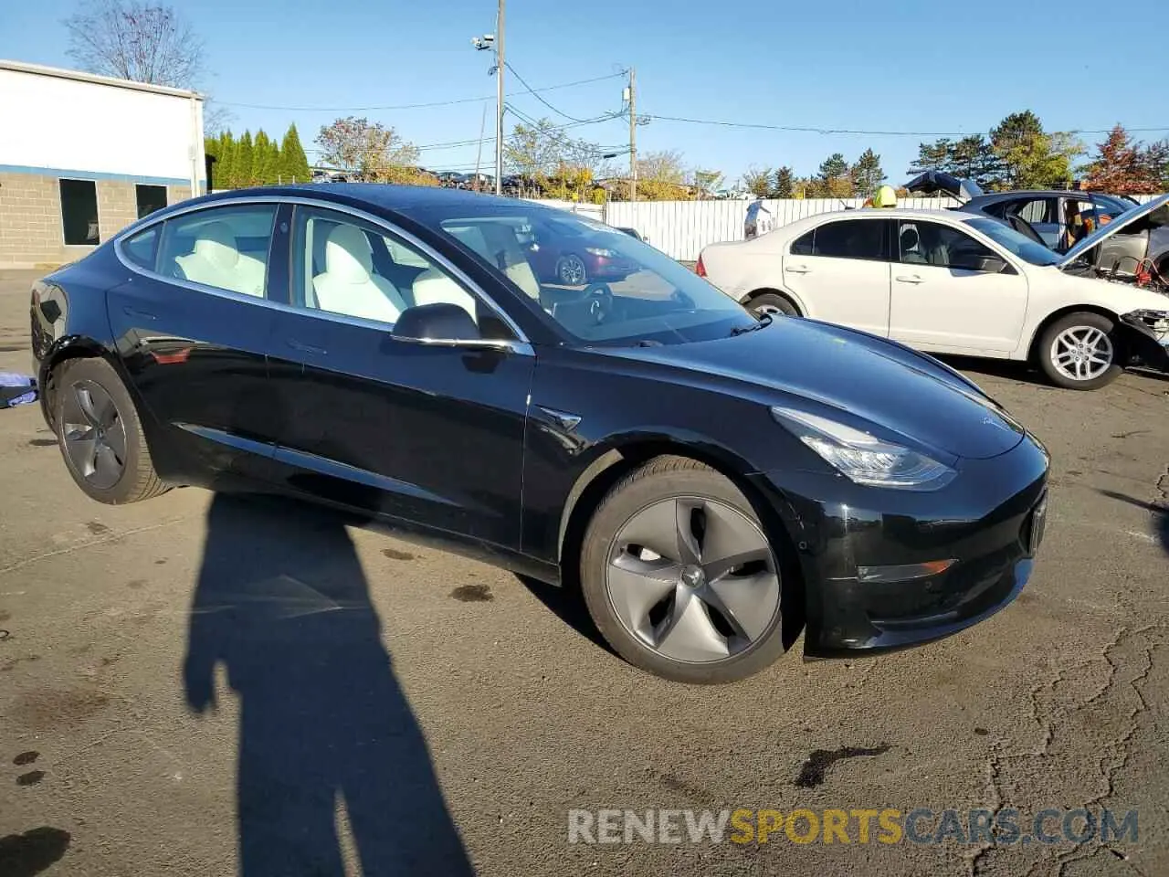 4 Photograph of a damaged car 5YJ3E1EB5LF600940 TESLA MODEL 3 2020