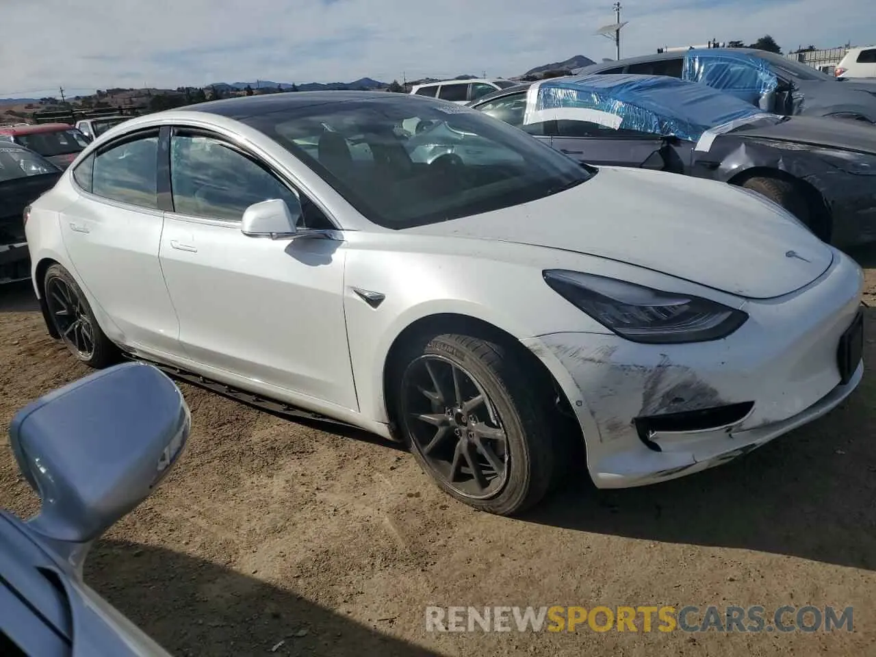 4 Photograph of a damaged car 5YJ3E1EB5LF619231 TESLA MODEL 3 2020