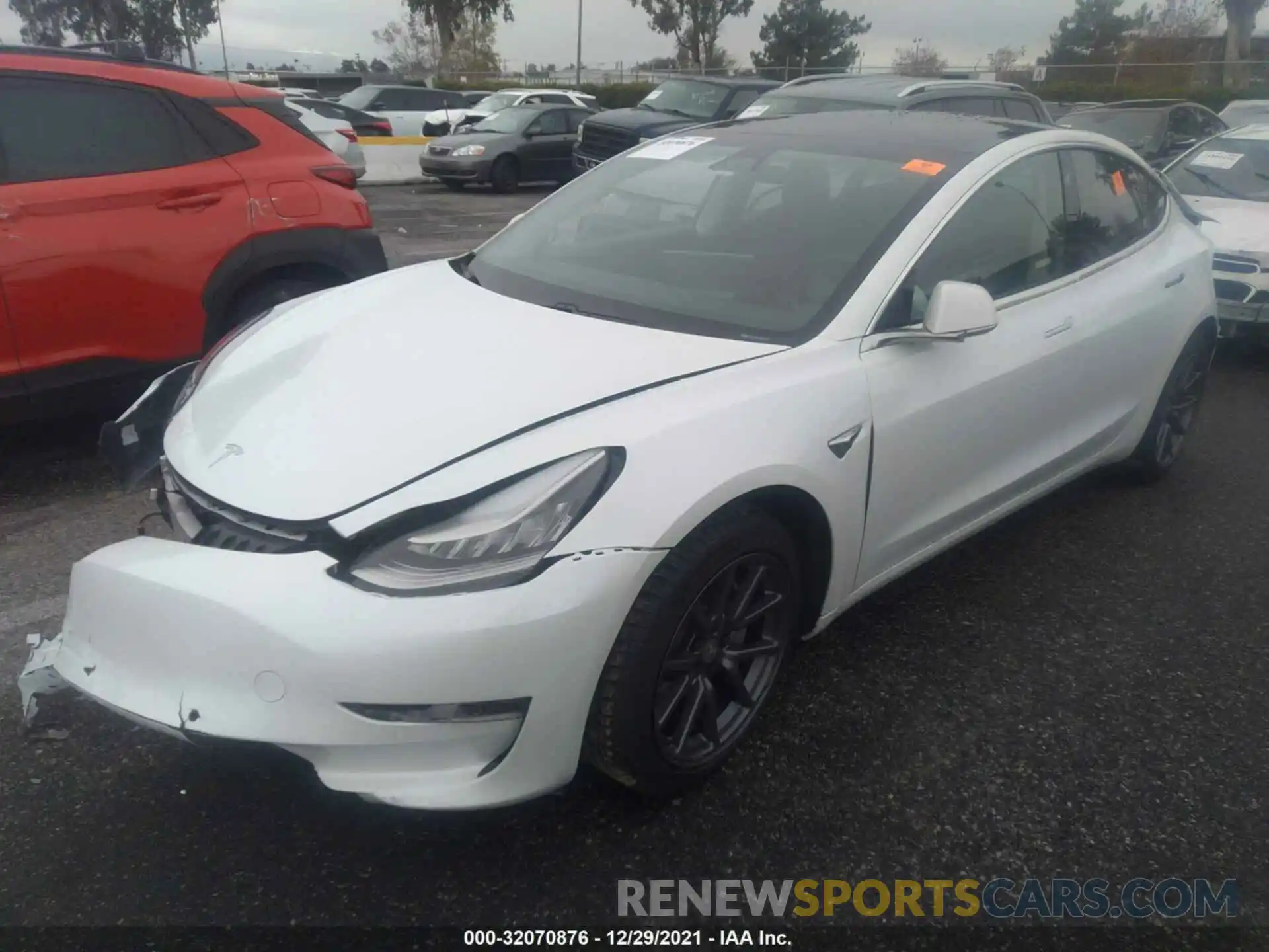 2 Photograph of a damaged car 5YJ3E1EB5LF619603 TESLA MODEL 3 2020