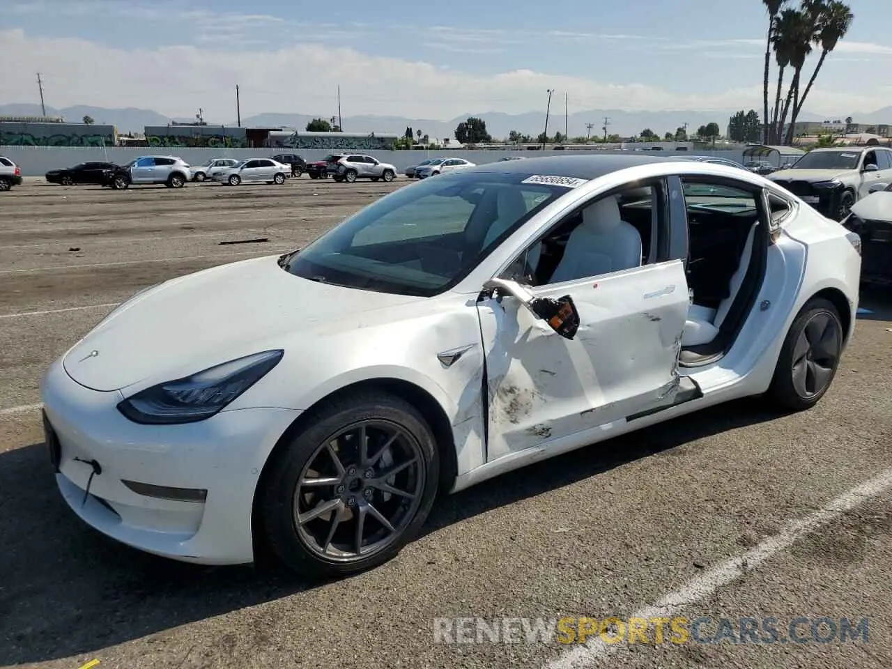1 Photograph of a damaged car 5YJ3E1EB5LF651662 TESLA MODEL 3 2020
