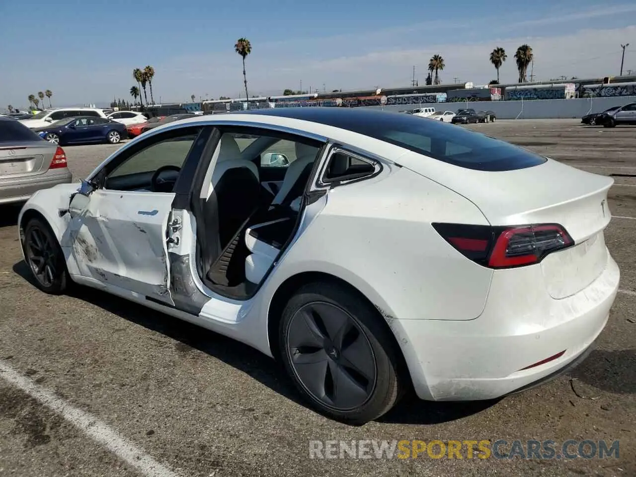 2 Photograph of a damaged car 5YJ3E1EB5LF651662 TESLA MODEL 3 2020