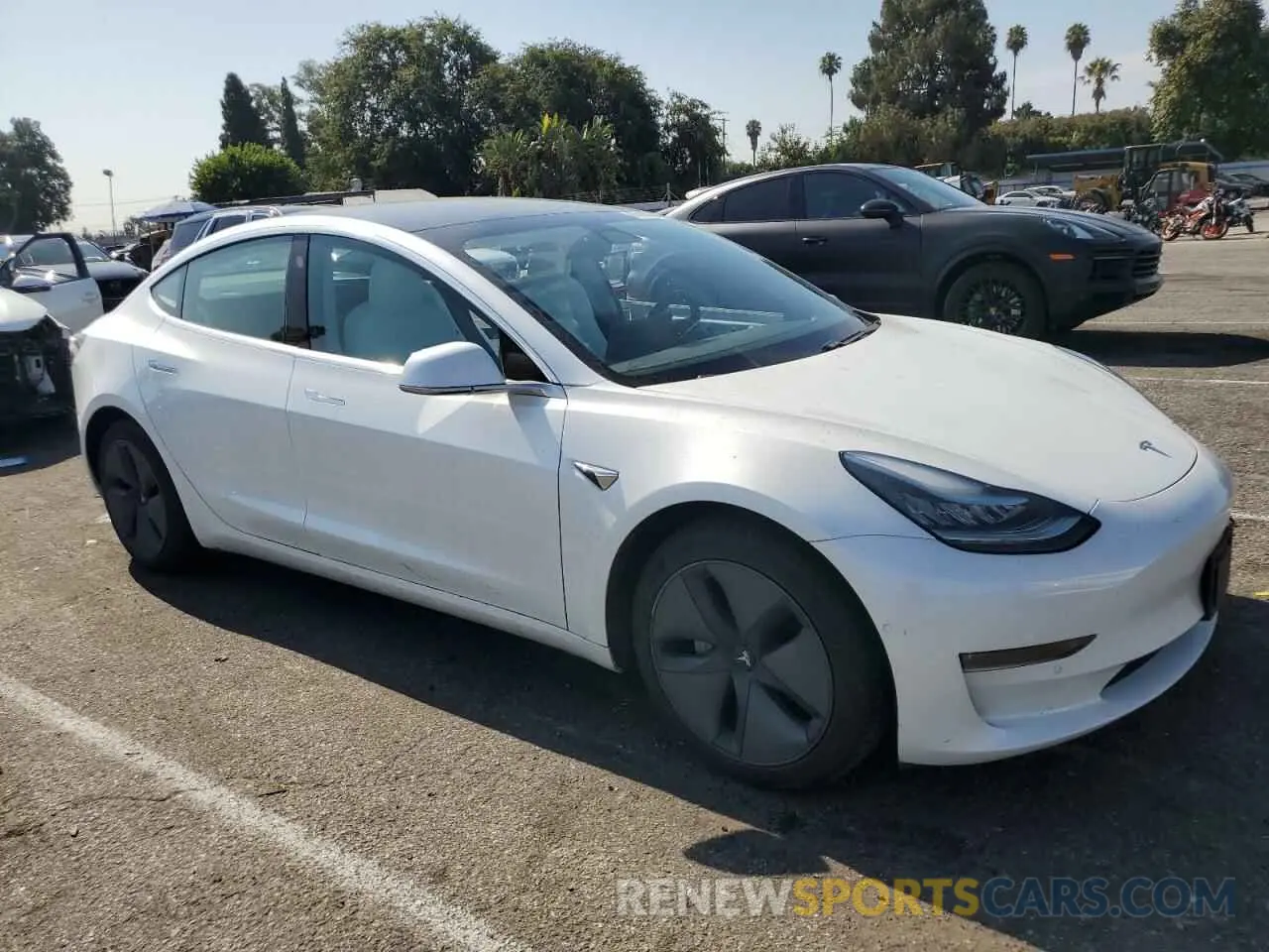 4 Photograph of a damaged car 5YJ3E1EB5LF651662 TESLA MODEL 3 2020