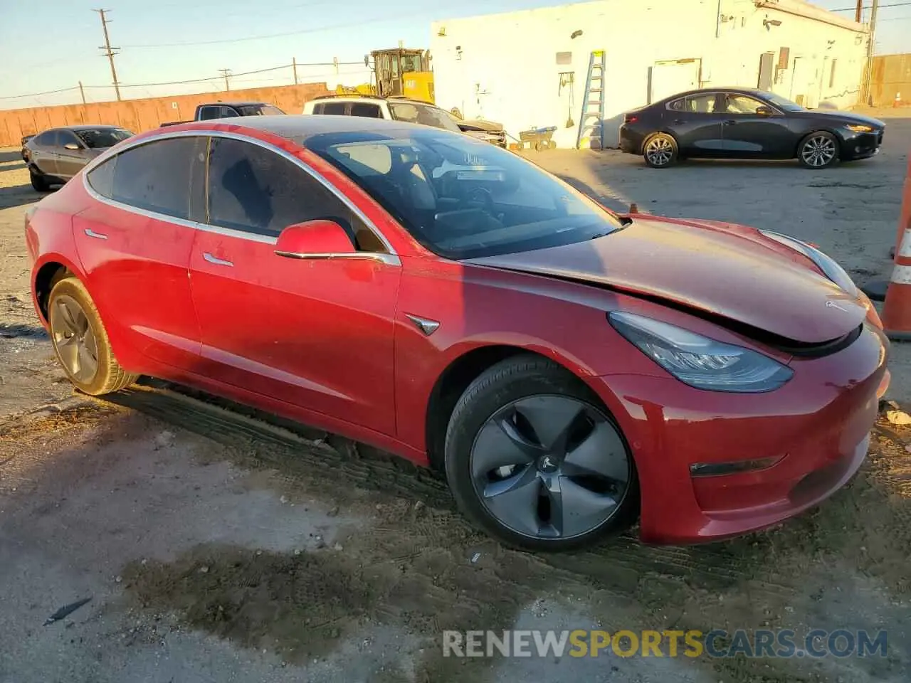 4 Photograph of a damaged car 5YJ3E1EB5LF711004 TESLA MODEL 3 2020
