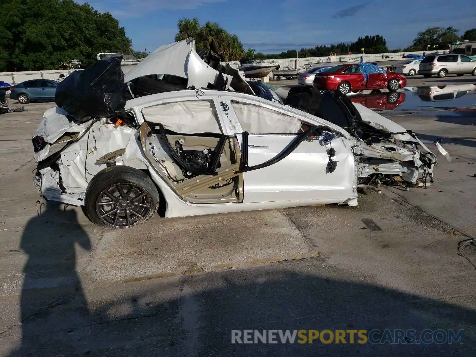 9 Photograph of a damaged car 5YJ3E1EB5LF744424 TESLA MODEL 3 2020