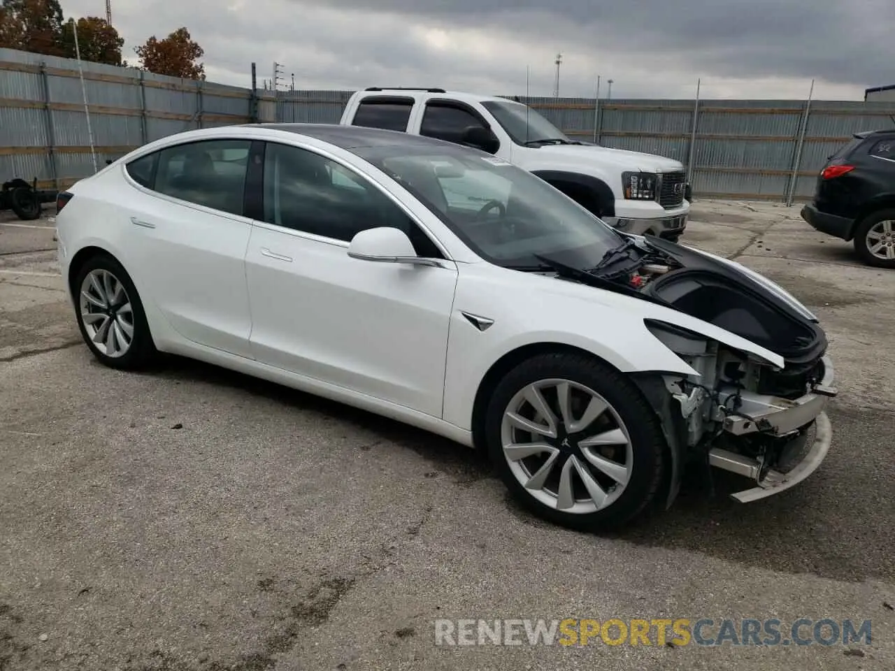 4 Photograph of a damaged car 5YJ3E1EB6LF589124 TESLA MODEL 3 2020