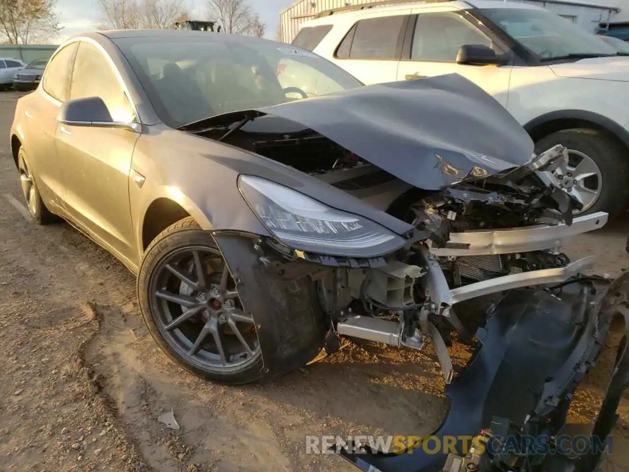 1 Photograph of a damaged car 5YJ3E1EB6LF589219 TESLA MODEL 3 2020