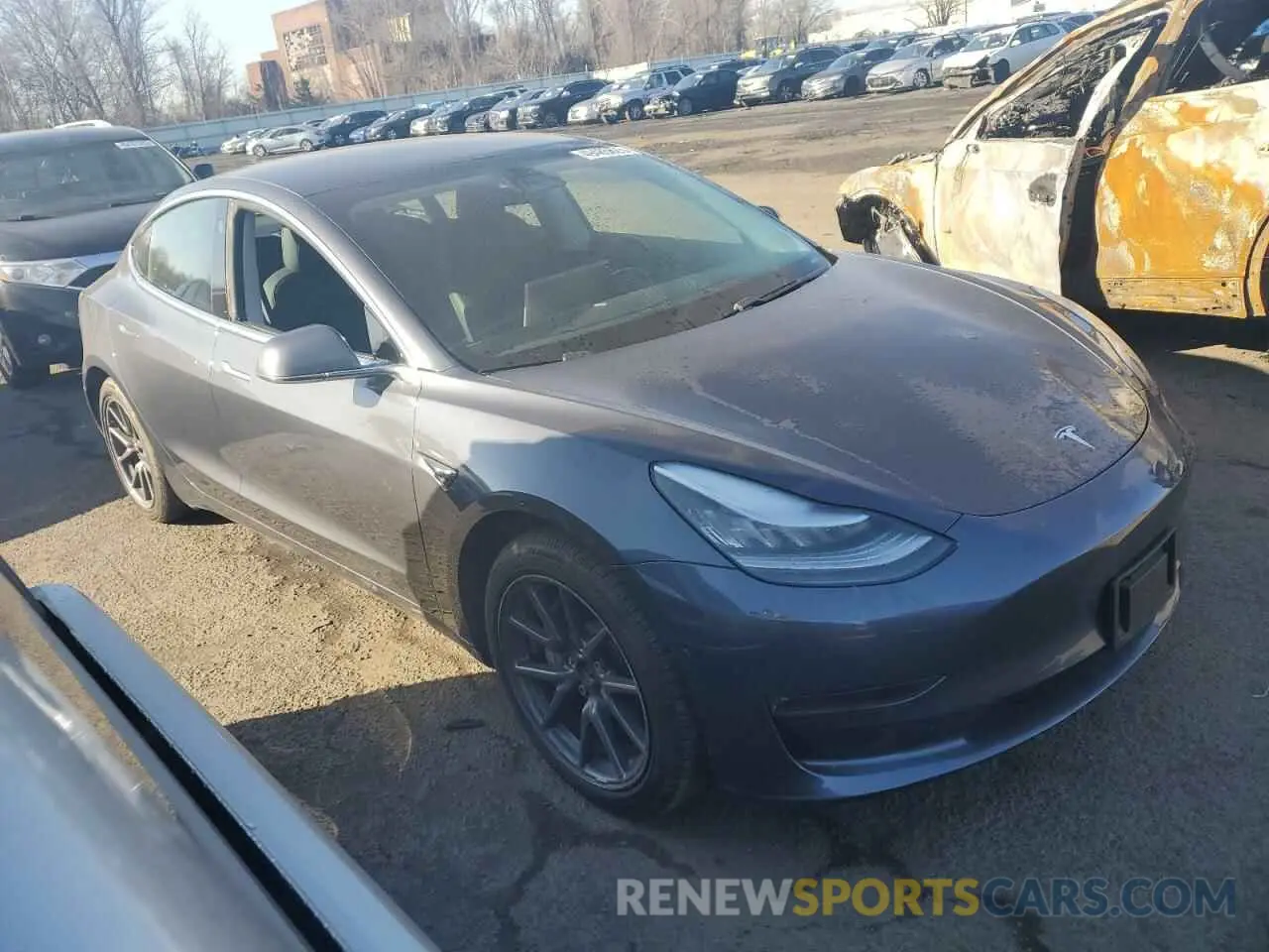 4 Photograph of a damaged car 5YJ3E1EB6LF616807 TESLA MODEL 3 2020