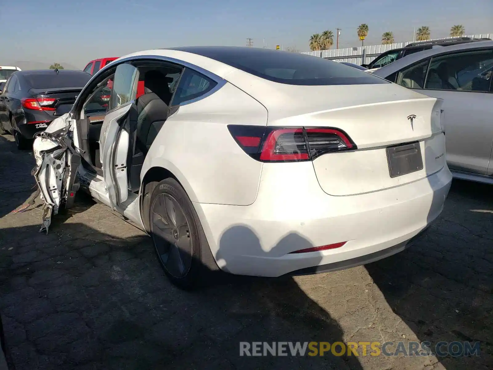 3 Photograph of a damaged car 5YJ3E1EB6LF618394 TESLA MODEL 3 2020