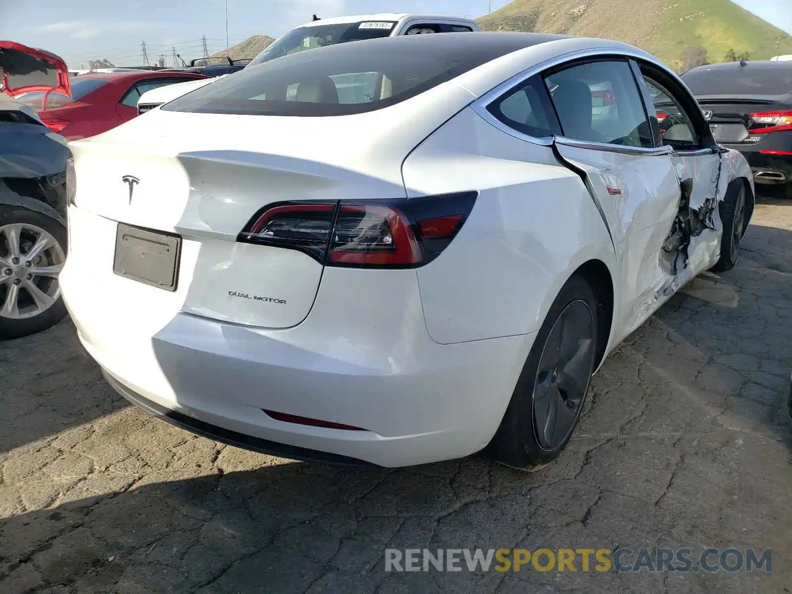 4 Photograph of a damaged car 5YJ3E1EB6LF618394 TESLA MODEL 3 2020