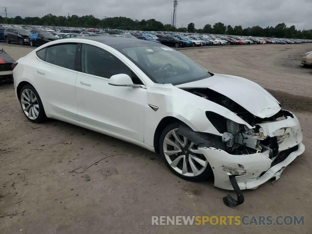 4 Photograph of a damaged car 5YJ3E1EB6LF618590 TESLA MODEL 3 2020