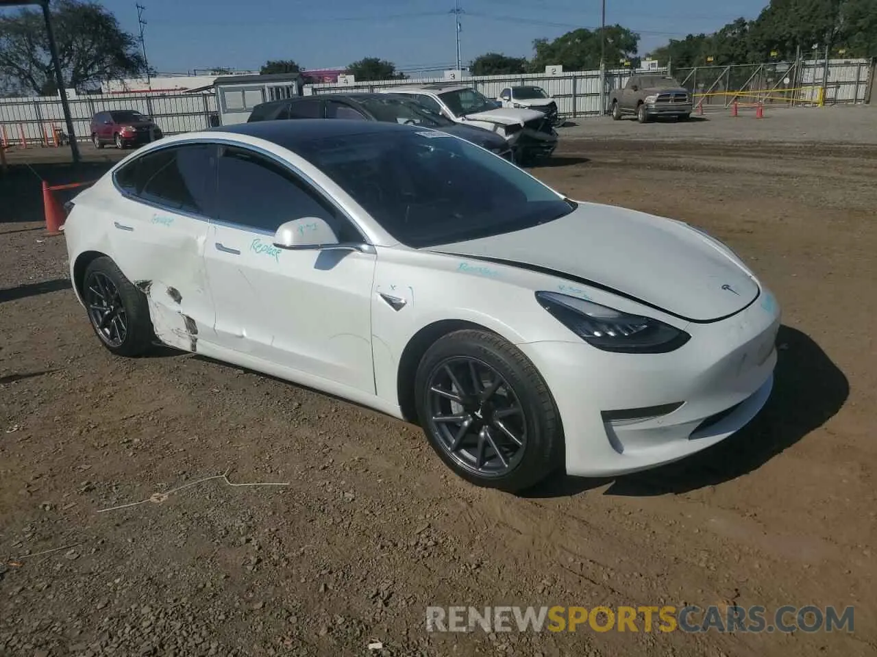 4 Photograph of a damaged car 5YJ3E1EB6LF619125 TESLA MODEL 3 2020