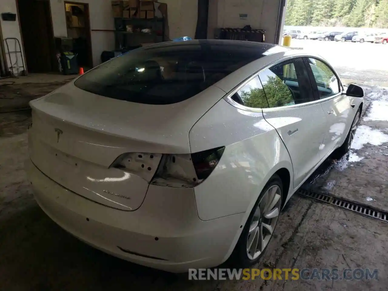 4 Photograph of a damaged car 5YJ3E1EB6LF621392 TESLA MODEL 3 2020