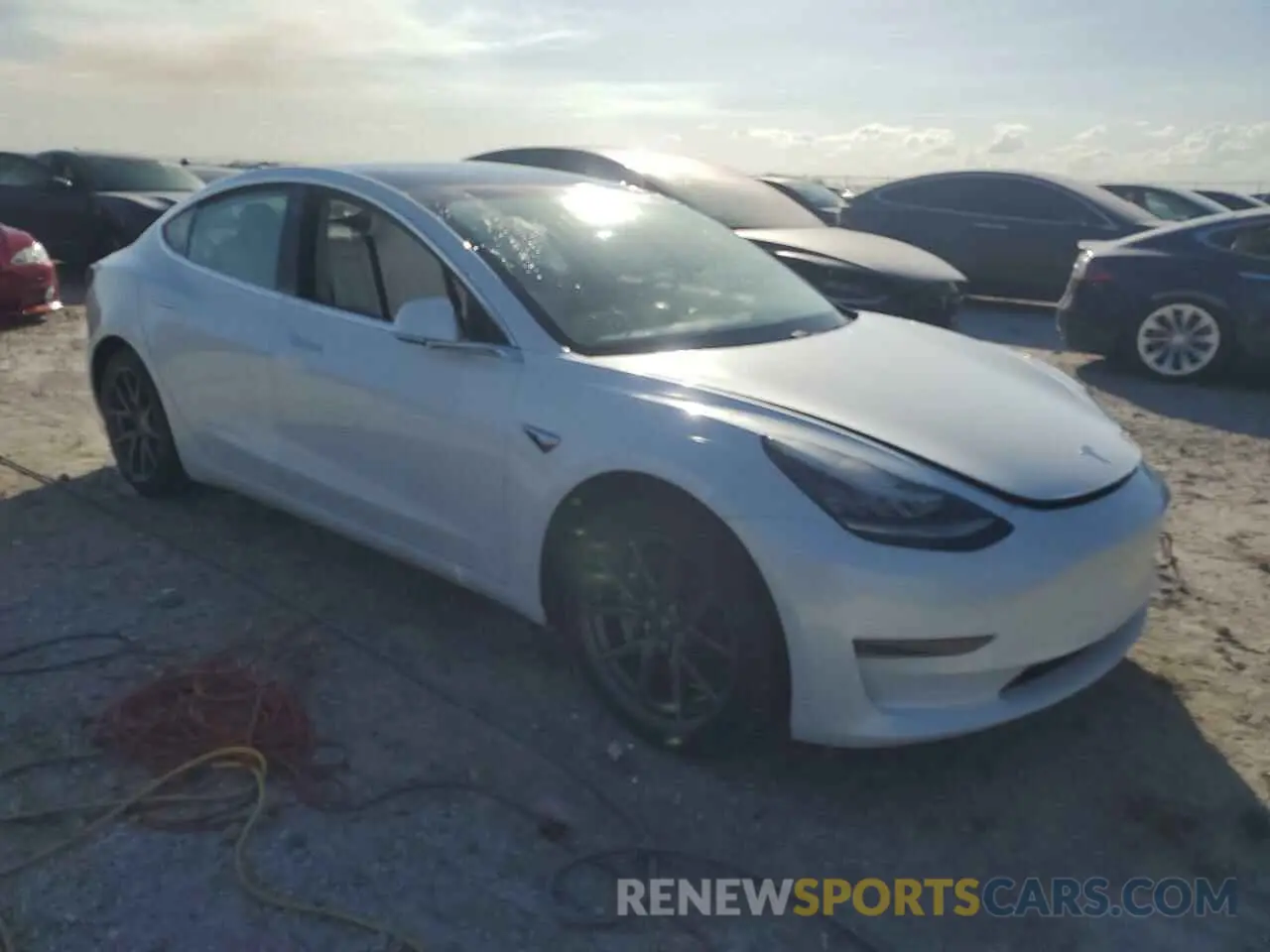 4 Photograph of a damaged car 5YJ3E1EB6LF622056 TESLA MODEL 3 2020