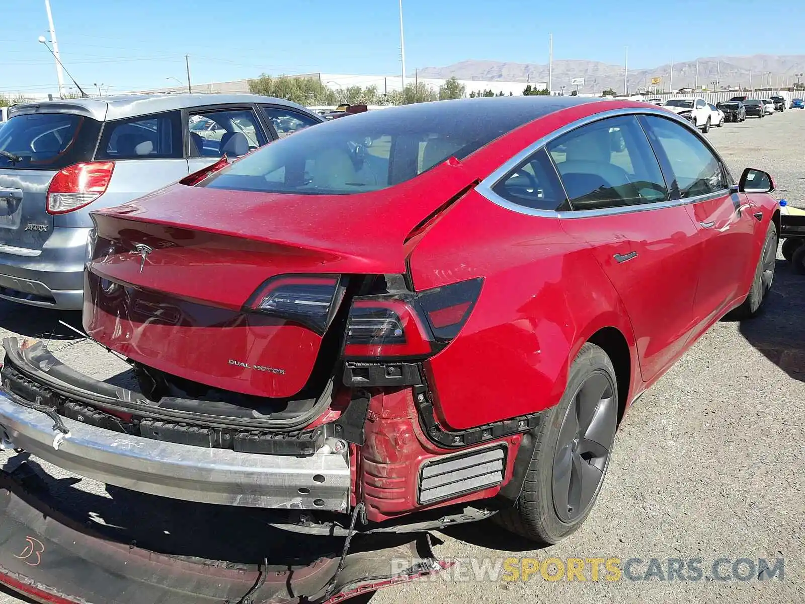 4 Photograph of a damaged car 5YJ3E1EB6LF628603 TESLA MODEL 3 2020