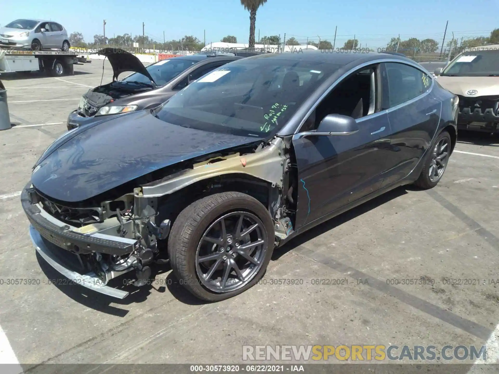 2 Photograph of a damaged car 5YJ3E1EB6LF635468 TESLA MODEL 3 2020