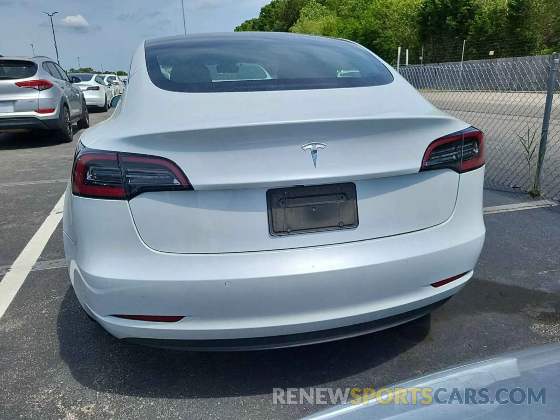 12 Photograph of a damaged car 5YJ3E1EB6LF637298 TESLA MODEL 3 2020