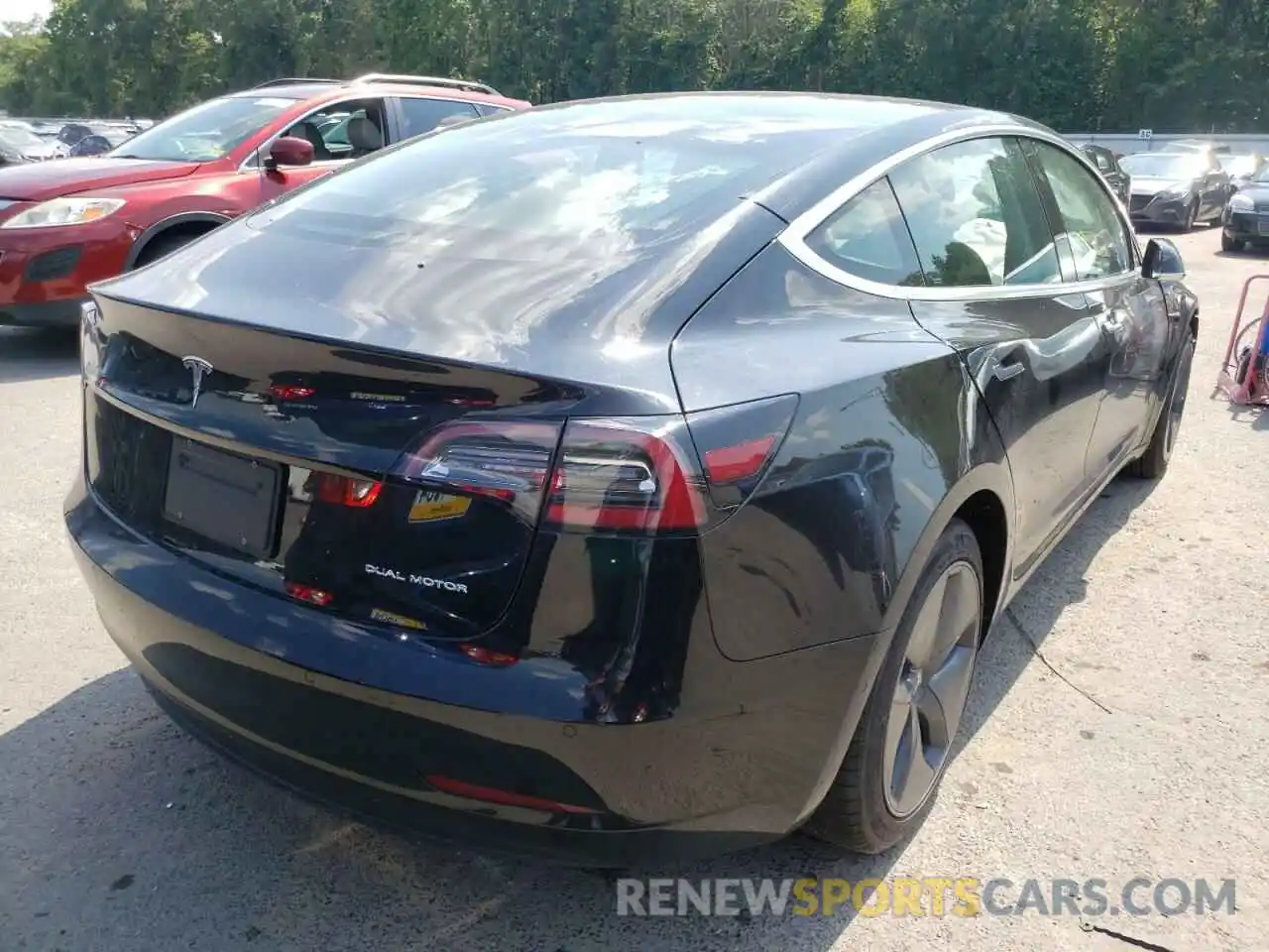 4 Photograph of a damaged car 5YJ3E1EB6LF662847 TESLA MODEL 3 2020