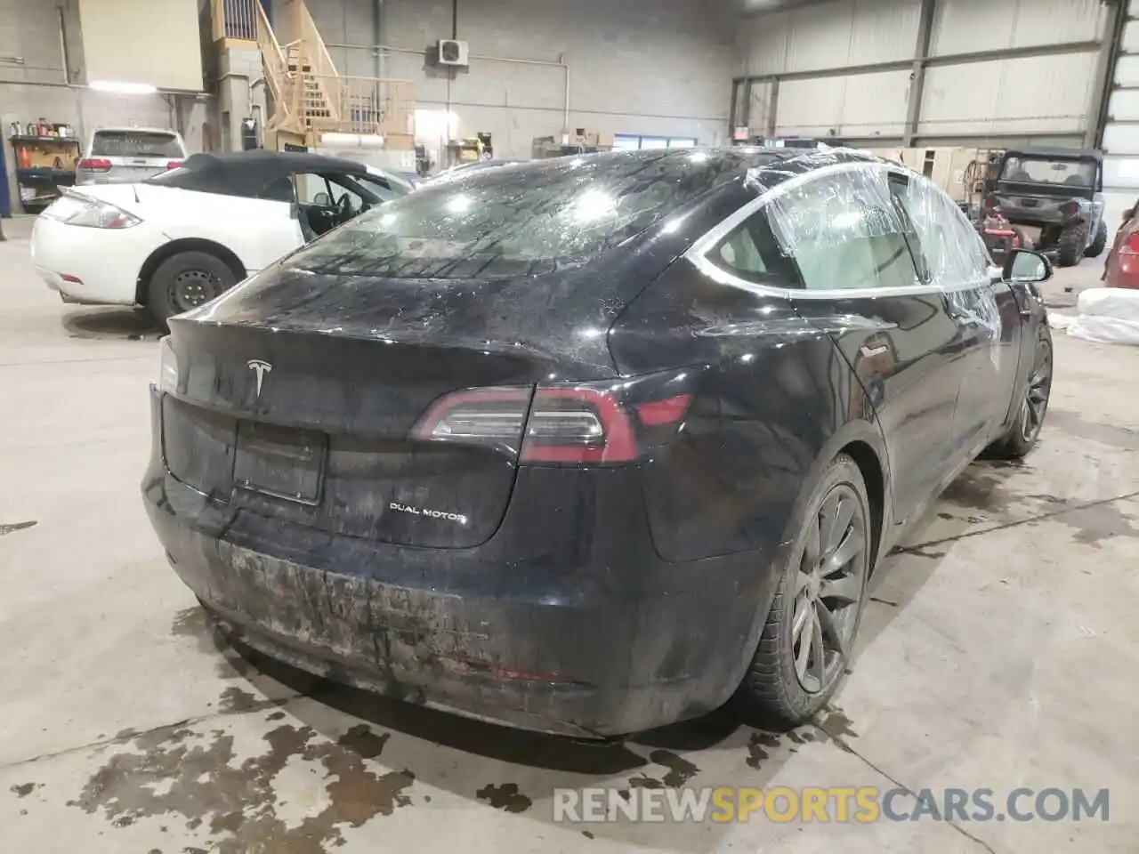 4 Photograph of a damaged car 5YJ3E1EB6LF670544 TESLA MODEL 3 2020