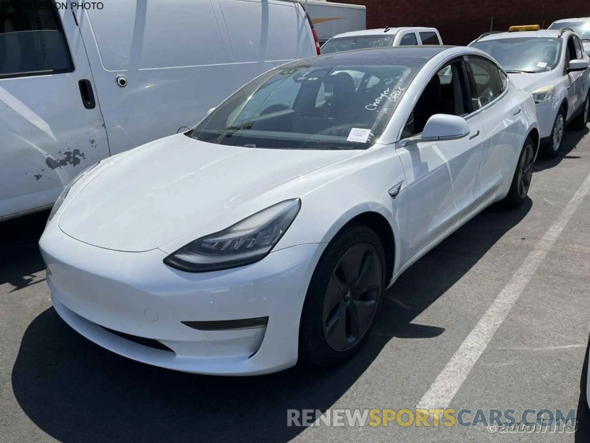 18 Photograph of a damaged car 5YJ3E1EB6LF803142 TESLA MODEL 3 2020