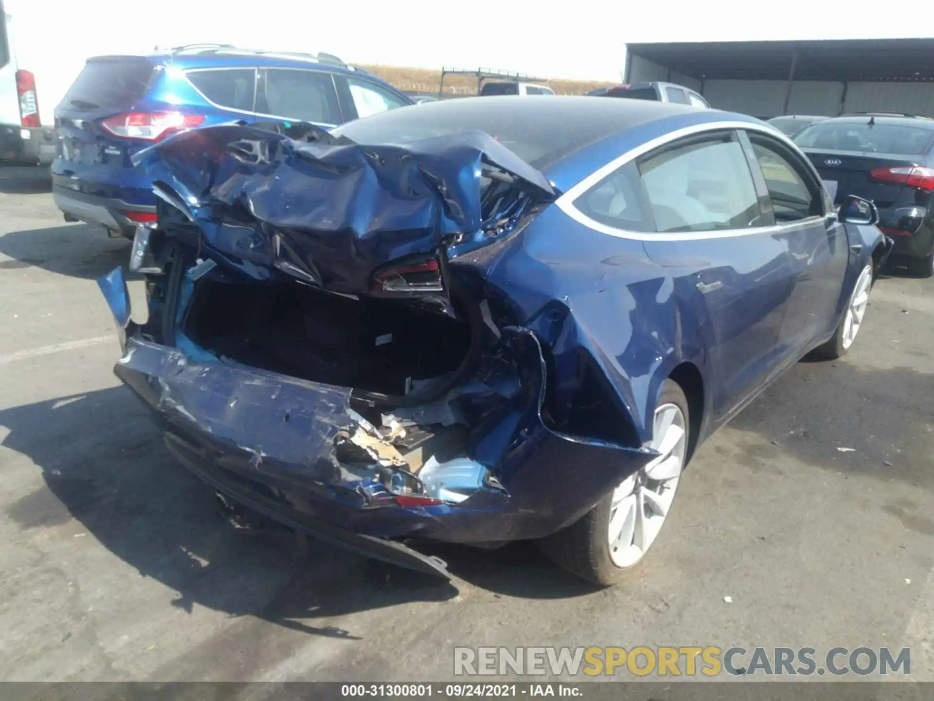 4 Photograph of a damaged car 5YJ3E1EB7LF622602 TESLA MODEL 3 2020