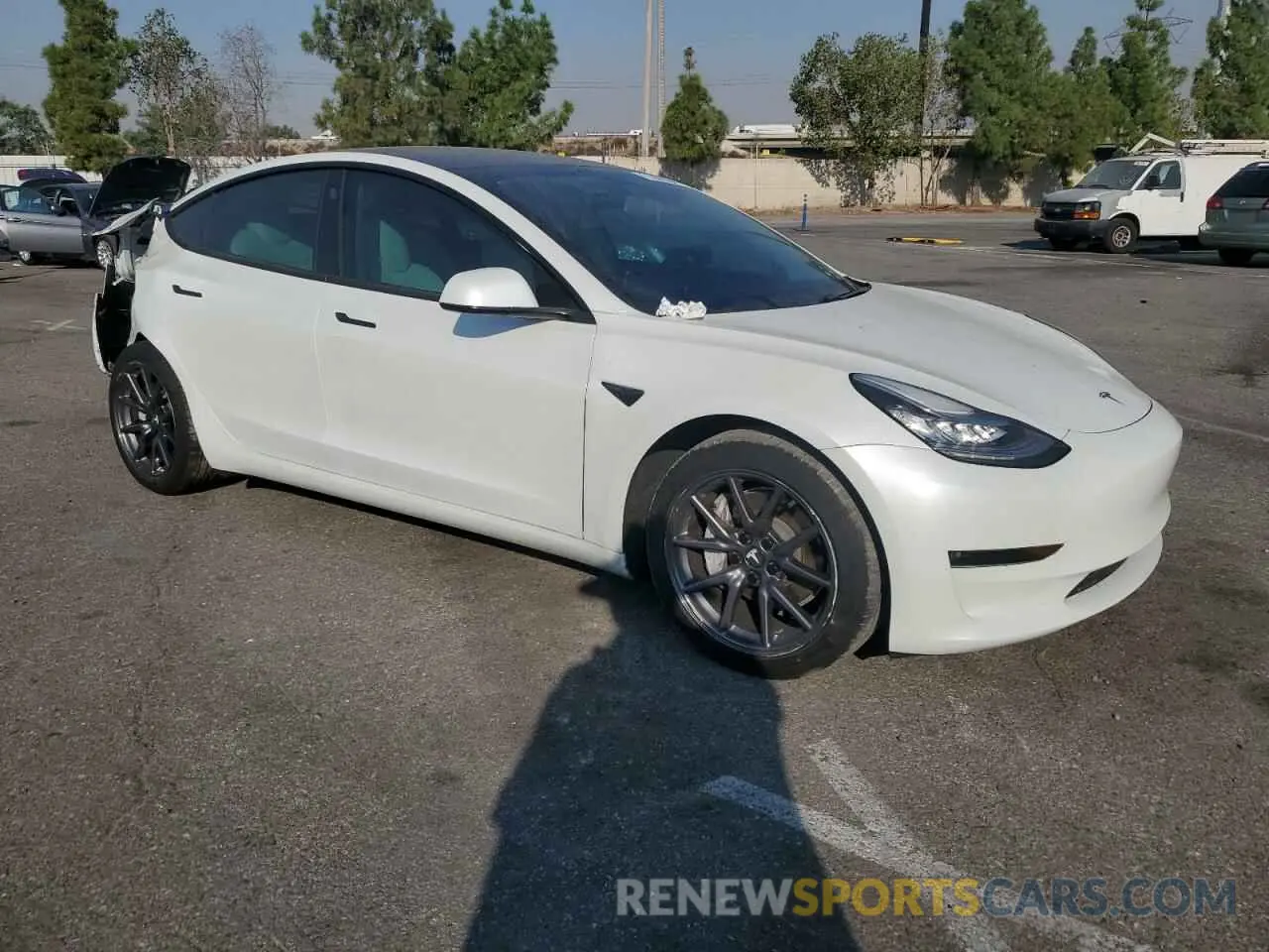 4 Photograph of a damaged car 5YJ3E1EB7LF651663 TESLA MODEL 3 2020