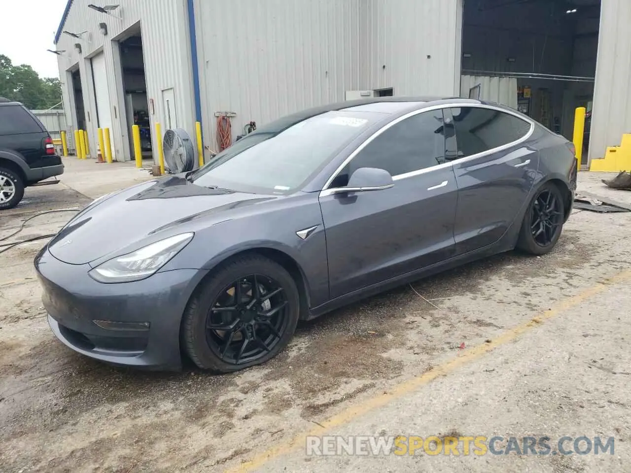 1 Photograph of a damaged car 5YJ3E1EB7LF710646 TESLA MODEL 3 2020