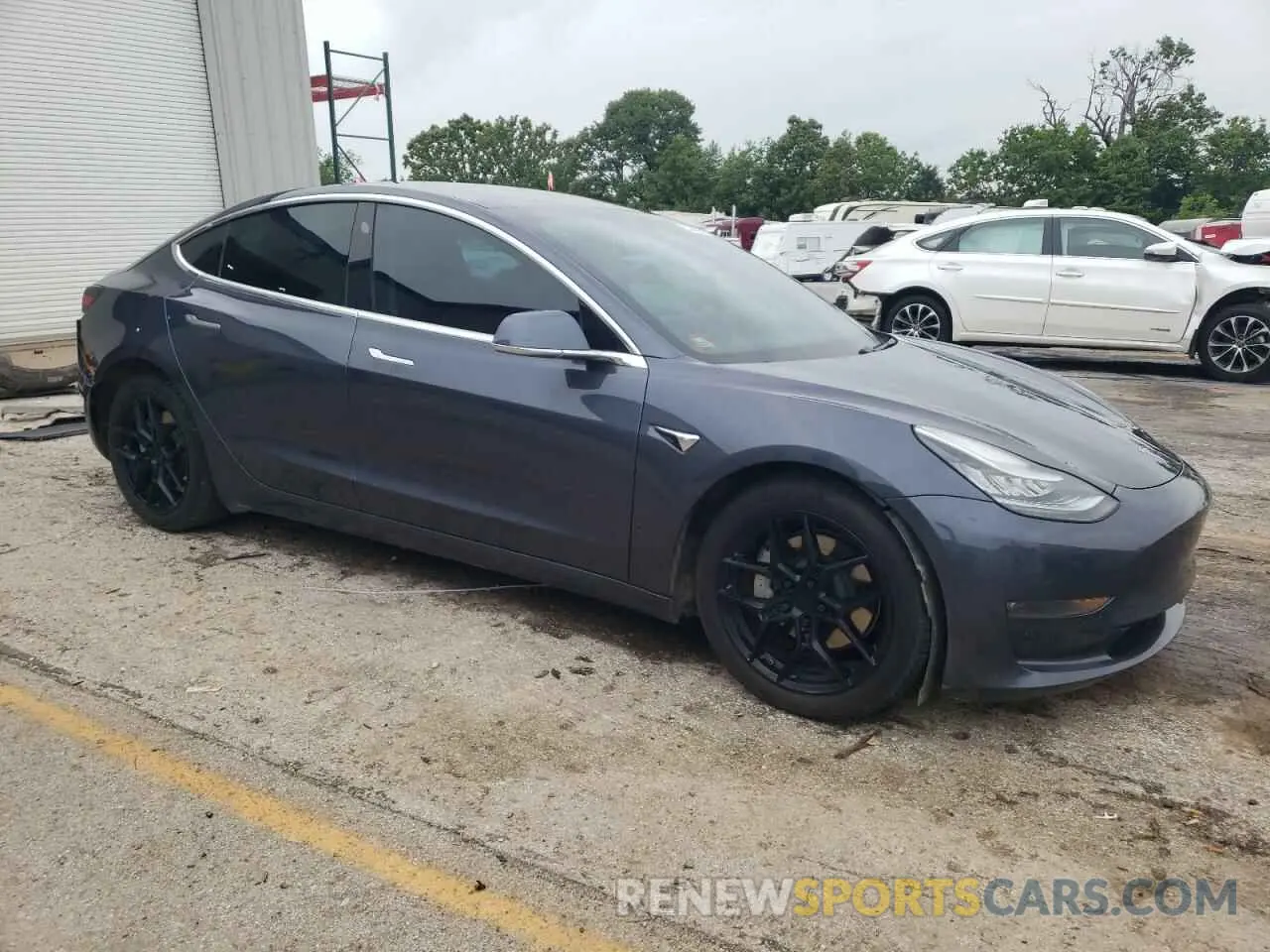 4 Photograph of a damaged car 5YJ3E1EB7LF710646 TESLA MODEL 3 2020