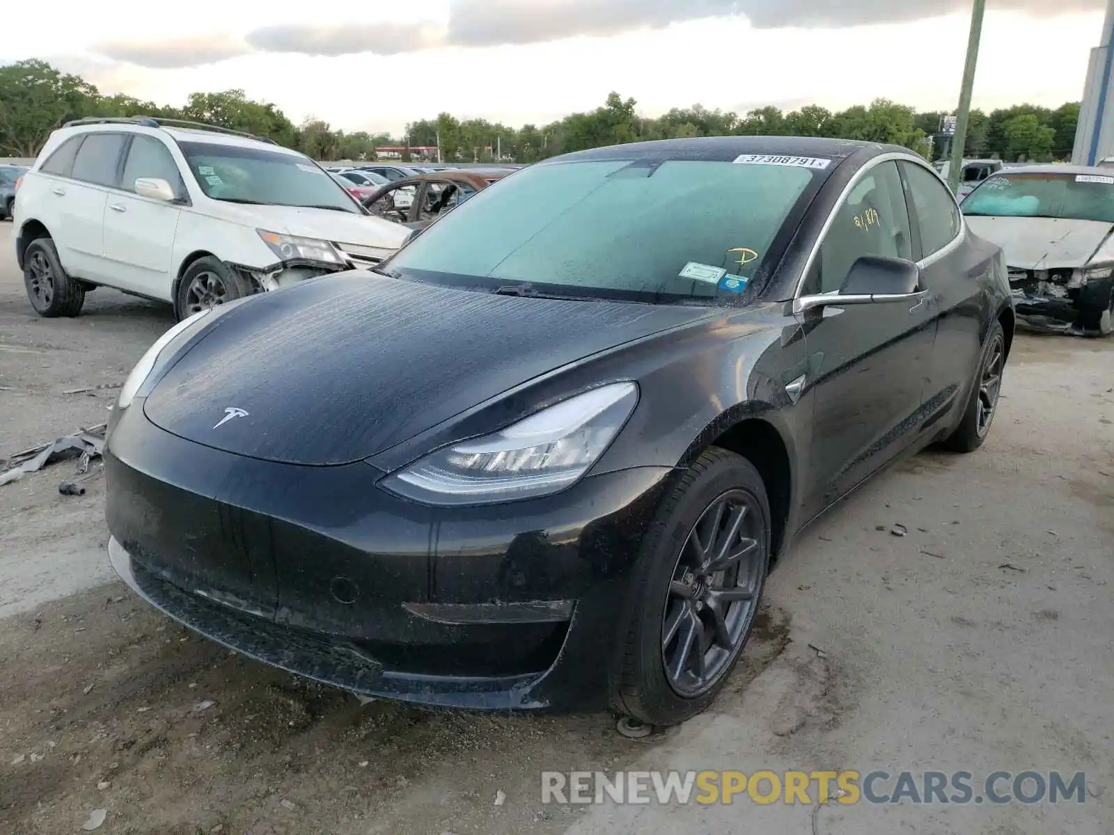 2 Photograph of a damaged car 5YJ3E1EB7LF770359 TESLA MODEL 3 2020