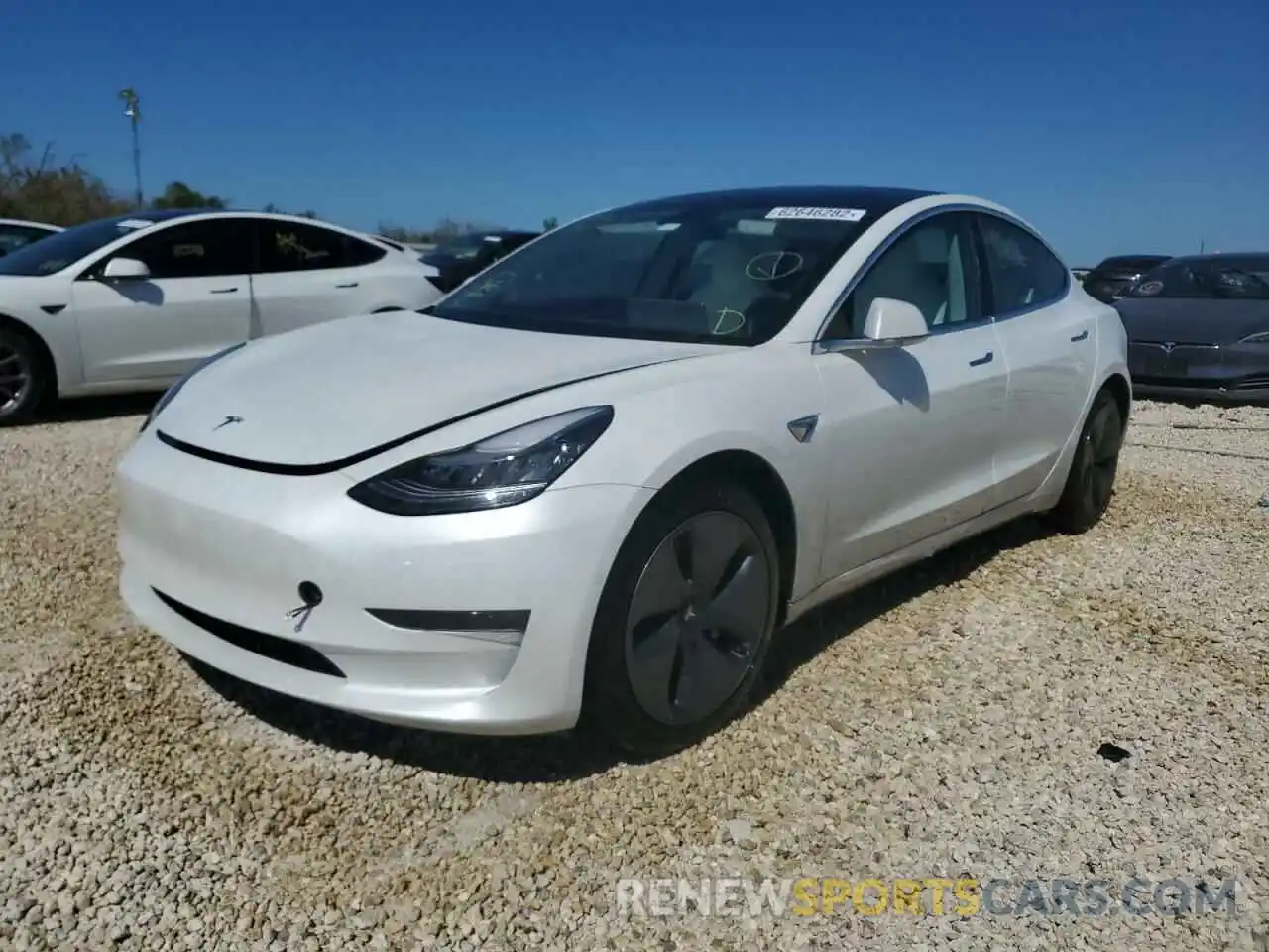 2 Photograph of a damaged car 5YJ3E1EB7LF787811 TESLA MODEL 3 2020