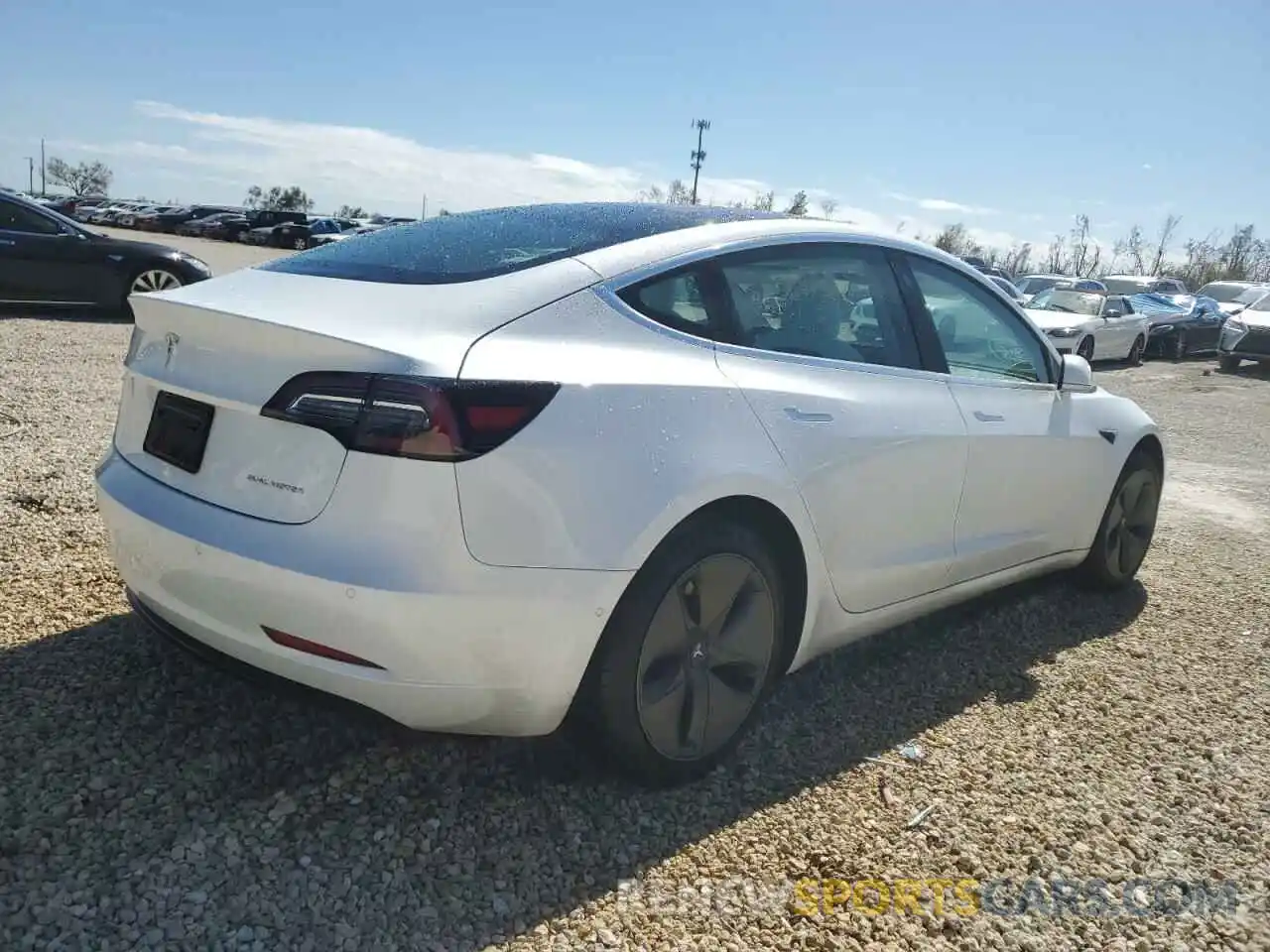 4 Photograph of a damaged car 5YJ3E1EB7LF787811 TESLA MODEL 3 2020