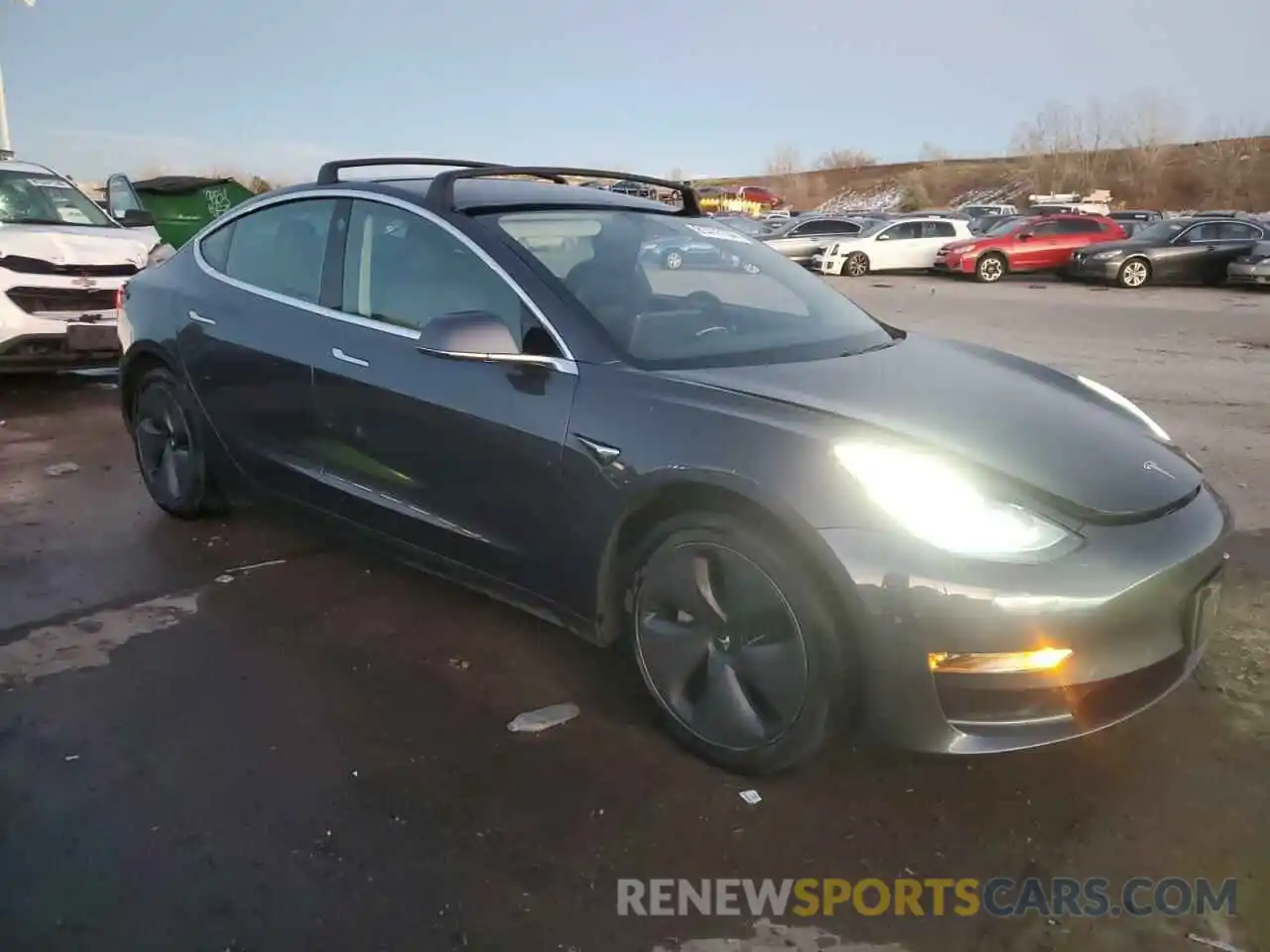 4 Photograph of a damaged car 5YJ3E1EB7LF800847 TESLA MODEL 3 2020