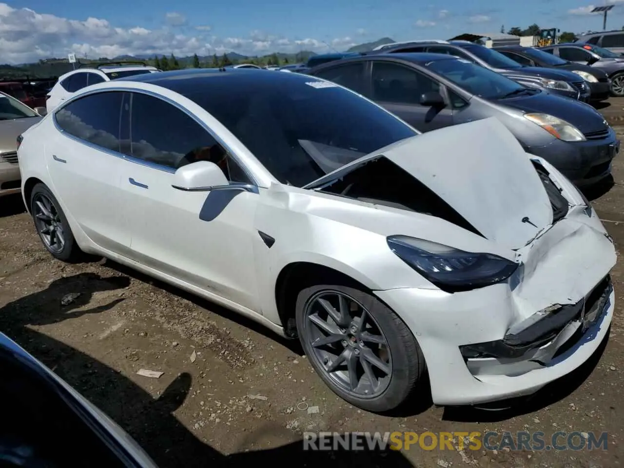 4 Photograph of a damaged car 5YJ3E1EB7LF806728 TESLA MODEL 3 2020