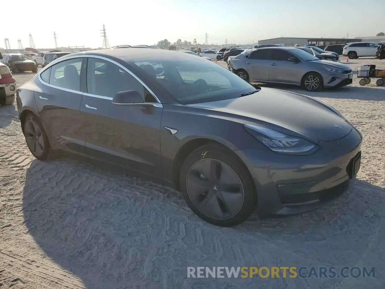 4 Photograph of a damaged car 5YJ3E1EB8LF510374 TESLA MODEL 3 2020